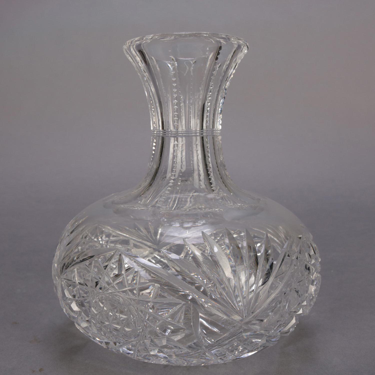 A Hawkes School American Brilliant Cut Glass wine carafe features squat cut crystal ball with ribbed neck terminating in flared mouth, 20th century.

Measures: 7.25