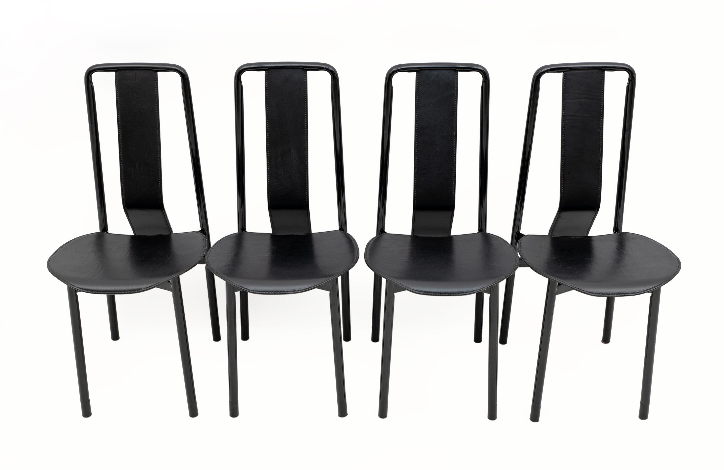 Vintage design dining chairs designed by Achille Castiglioni for Zanotta model Irma. Black lacquered metal structures with leather seats and backs.