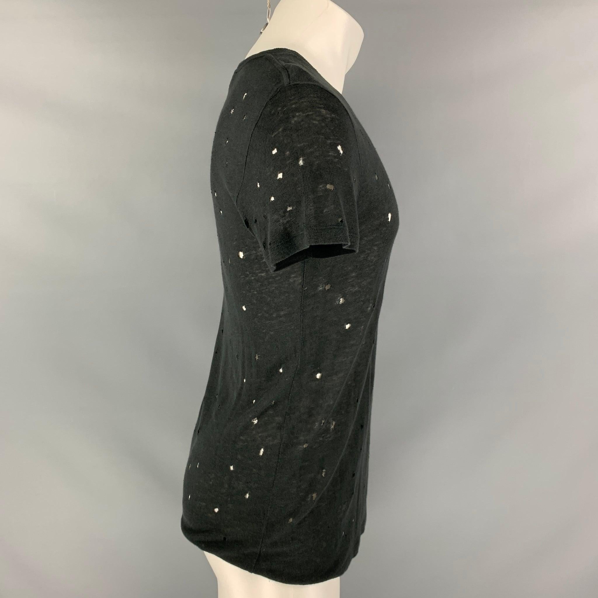 IRO 'Clay' t-shirt comes in a black linen featuring distressed details throughout and a crew-neck. Made in Portugal.Very Good Pre-Owned Condition. 

Marked:   XS 

Measurements: 
 
Shoulder: 18 inches Chest: 46 inches Sleeve: 8 inches Length: 26.5