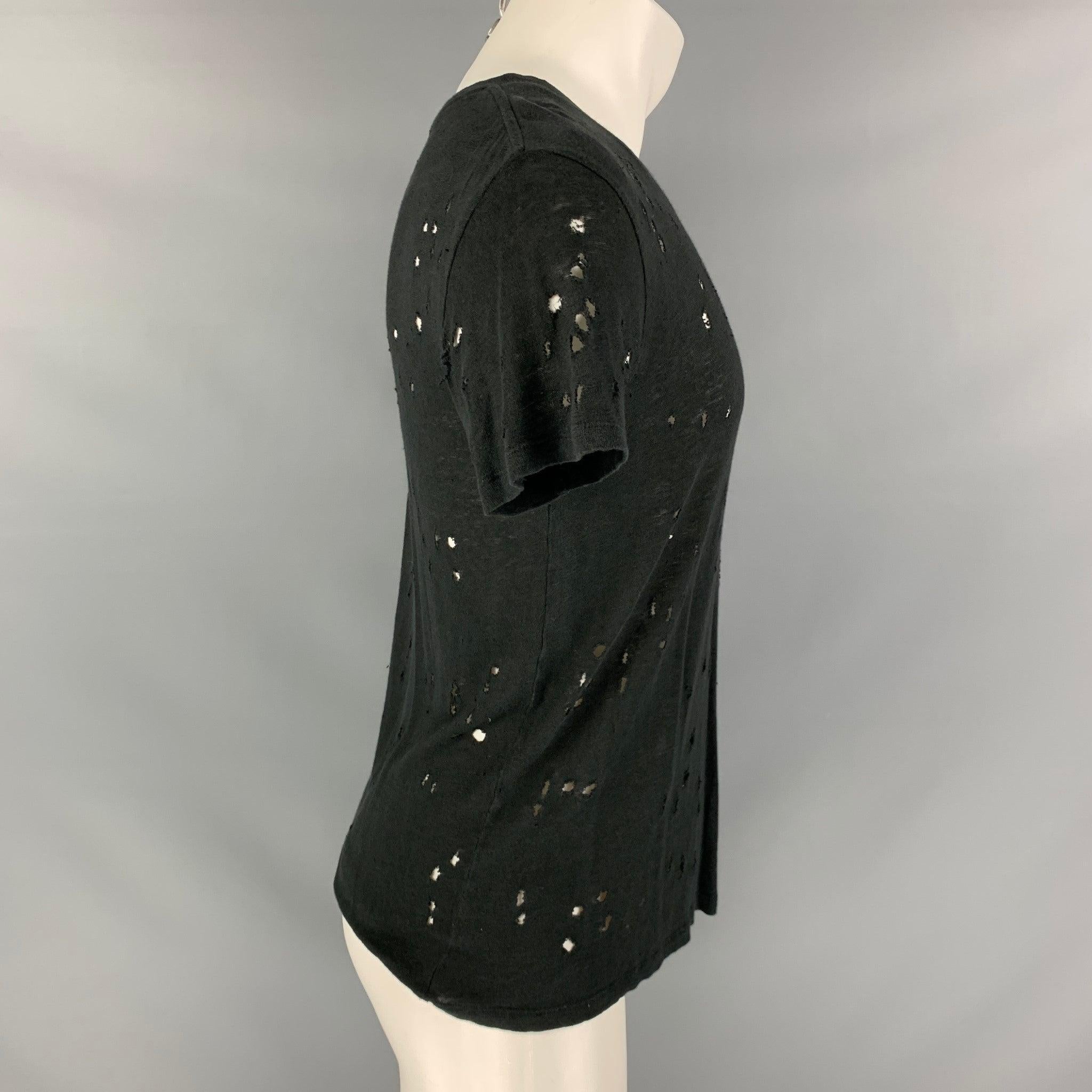 IRO 'Clay' t-shirt comes in a black linen featuring distressed details throughout and a crew-neck. Made in Portugal.Very Good Pre-Owned Condition. 

Marked:   XS 

Measurements: 
 
Shoulder: 18 inches Chest: 46 inches Sleeve: 8 inches Length: 26.5