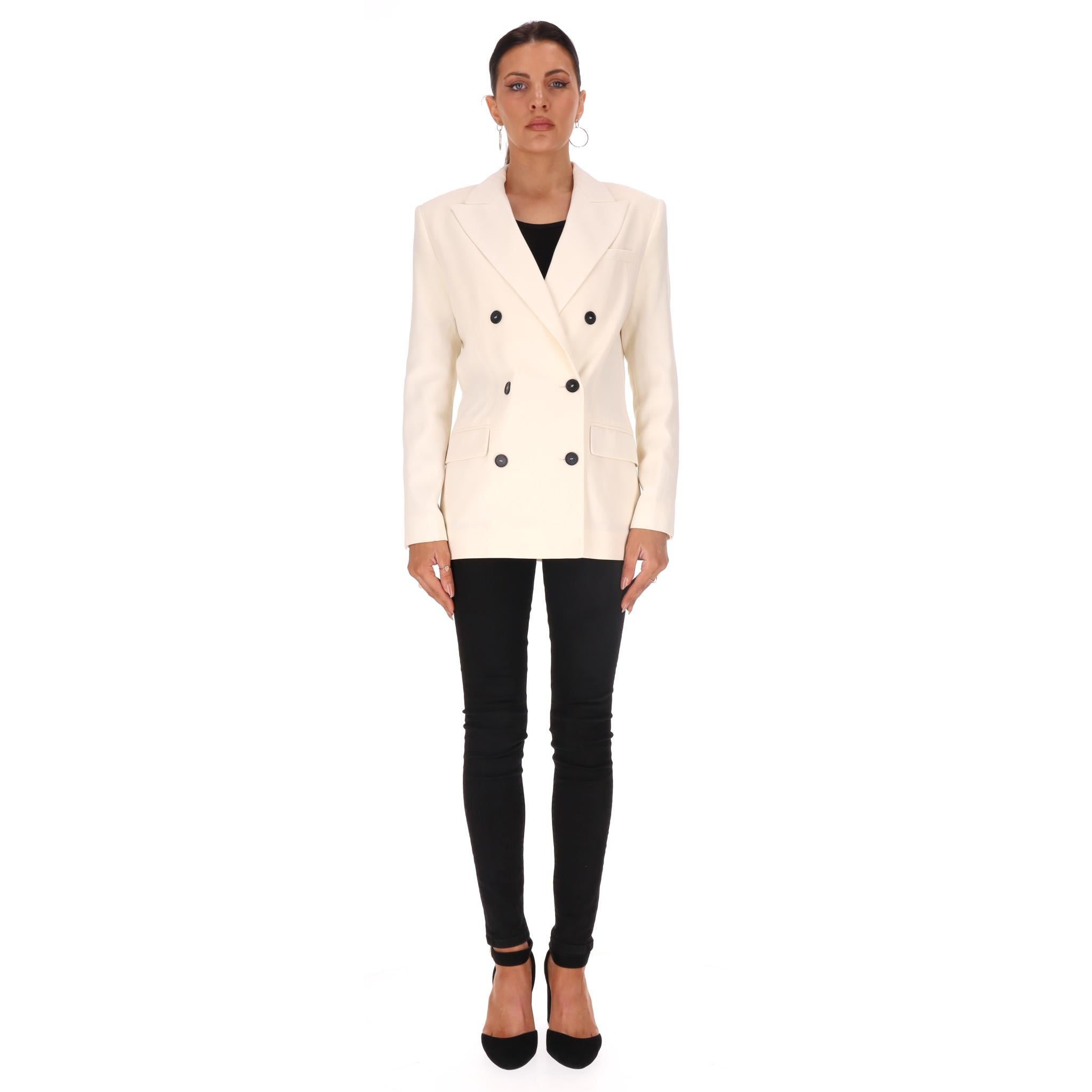 Iro Double-Breasted Wool Blend Blazer

Ivory 'Kristal' jacket crafted from wool blend with double-breasted  button fastening, shoulder pads and peak lapels.

Featuring branded black buttons, side flap pockets and central rear vent.

Rrp Approx.