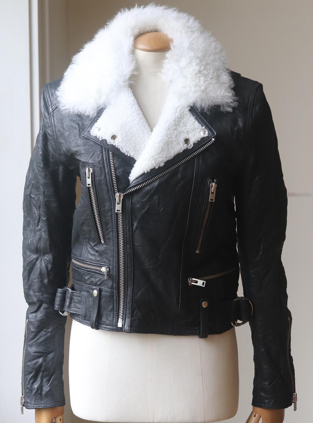 IRO's 'Noemie' biker jacket is a timeless investment you'll treasure forever, cut for a close fit, this piece is crafted from supple textured-leather as well as a shearling-fur collar and it has an zip fastening and silver hardware. White shearling,