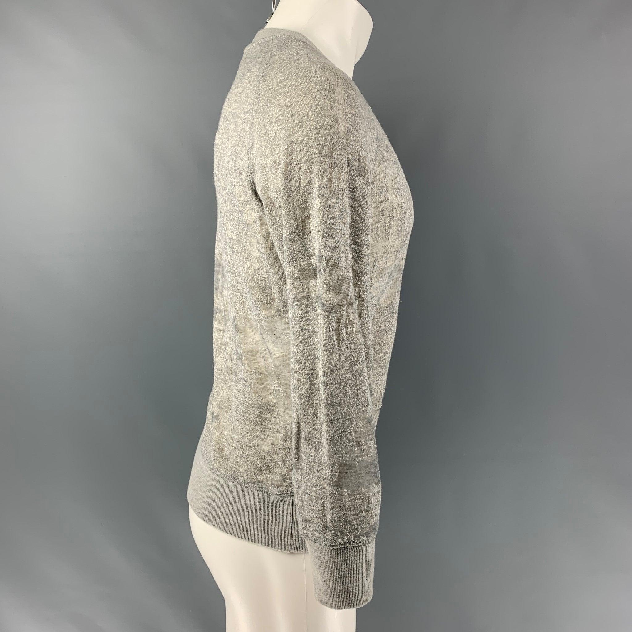 IRO JEANS Nona raglan long sleeve pullover comes in a heather grey partially see through cotton blend jersey featuring a distressed style and crew-neck. Excellent Pre-Owned Condition.  

Marked:   S 

Measurements: 
 
Shoulder: 21 inches Sleeves: 26