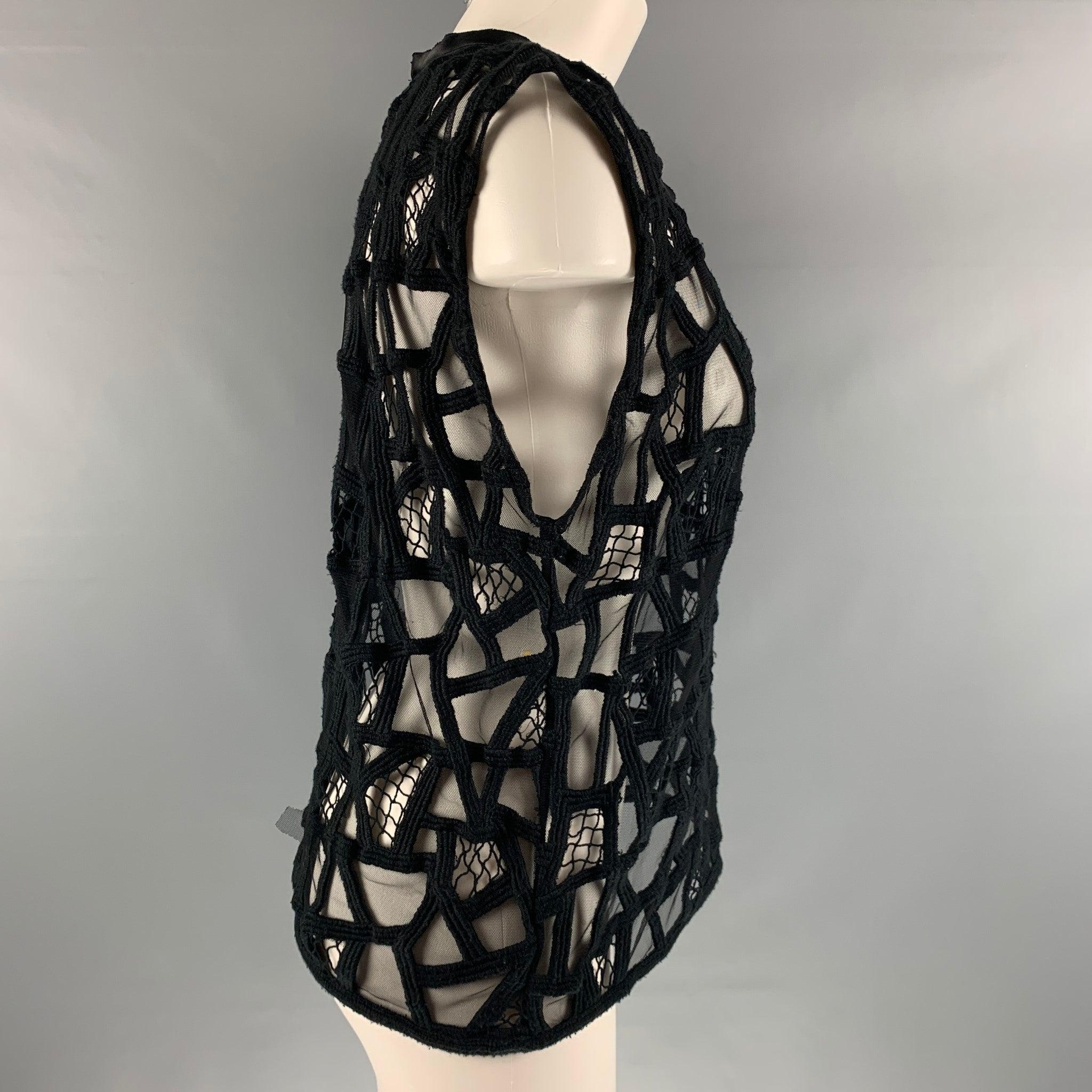 IRO OLPEN sleeveless casual top comes in a black mesh material featuring an abstract texture. Excellent Pre-Owned Condition. 

Marked:   38 

Measurements: 
 
Shoulder: 18 inches Bust: 44 inches Length: 22 inches 
 
  
  
 
Reference: