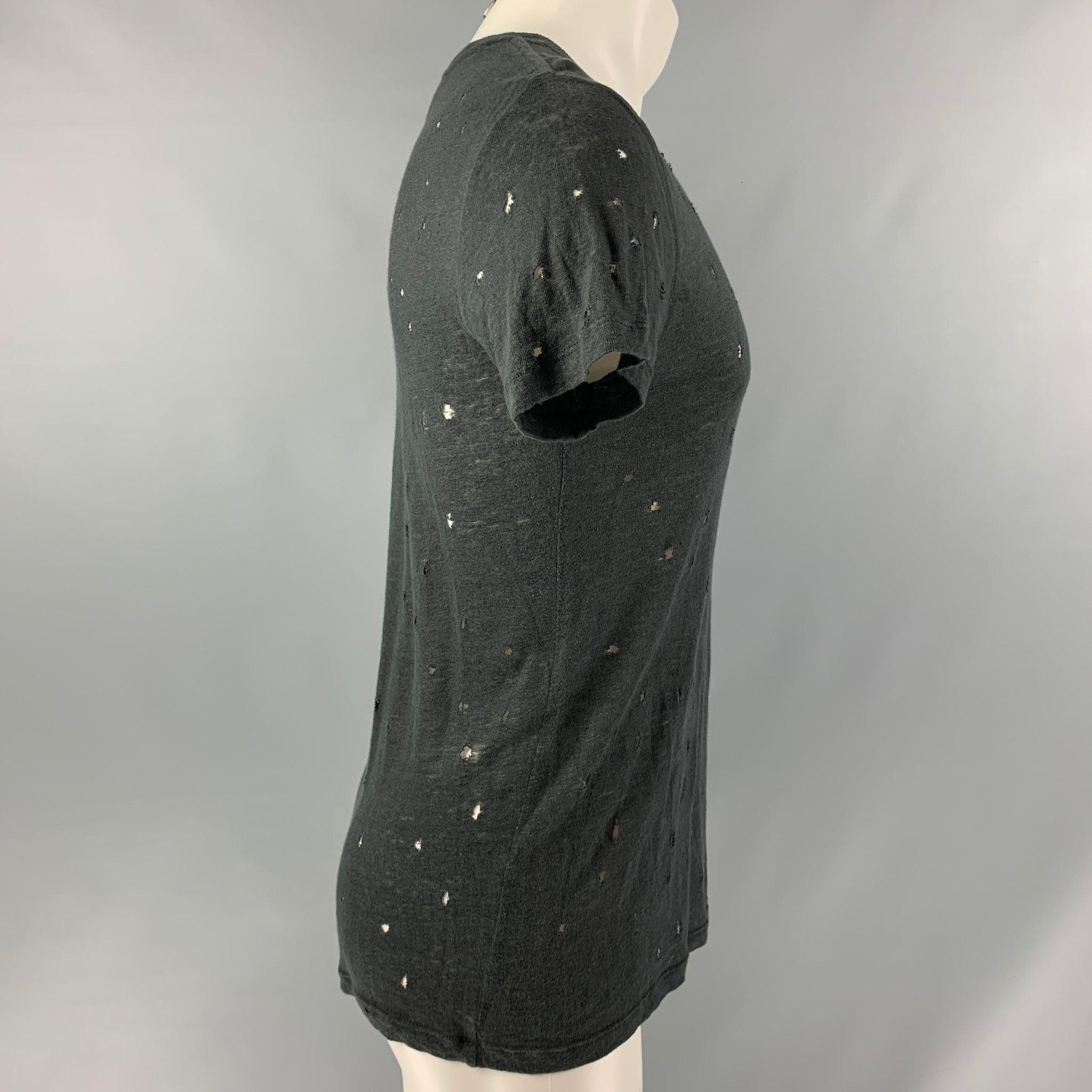 IRO 'Clay' t-shirt comes in a black linen featuring distressed details throughout and a crew-neck. Made in Portugal. Very Good Pre-Owned Condition.  

Marked:   S 

Measurements: 
 
Shoulder: 18 inches Chest: 46 inches Sleeve: 8 inches Length: 26.5