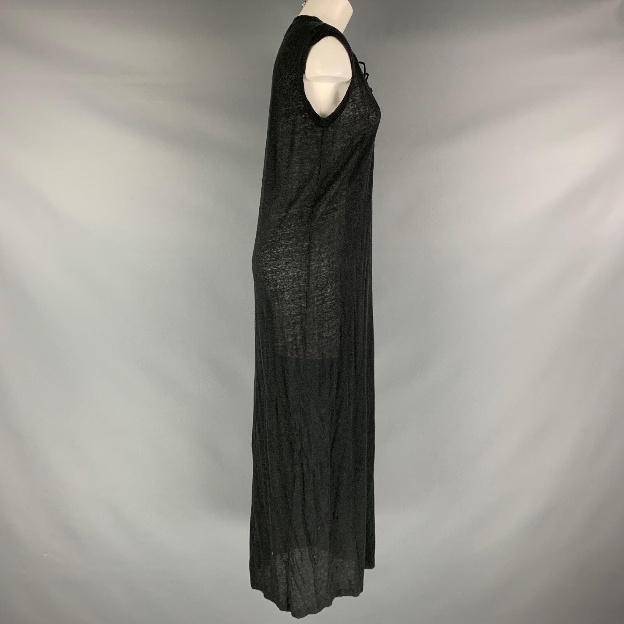 IRO 'Daisy 17S' long dress comes in a black partially see through cotton blend knit material featuring a see laced chest detail and shift dress silhouette. Excellent Pre-Owned Condition. 

Marked:  SShoulder: 17.5 inches Bust: 42 inches Hip: 42