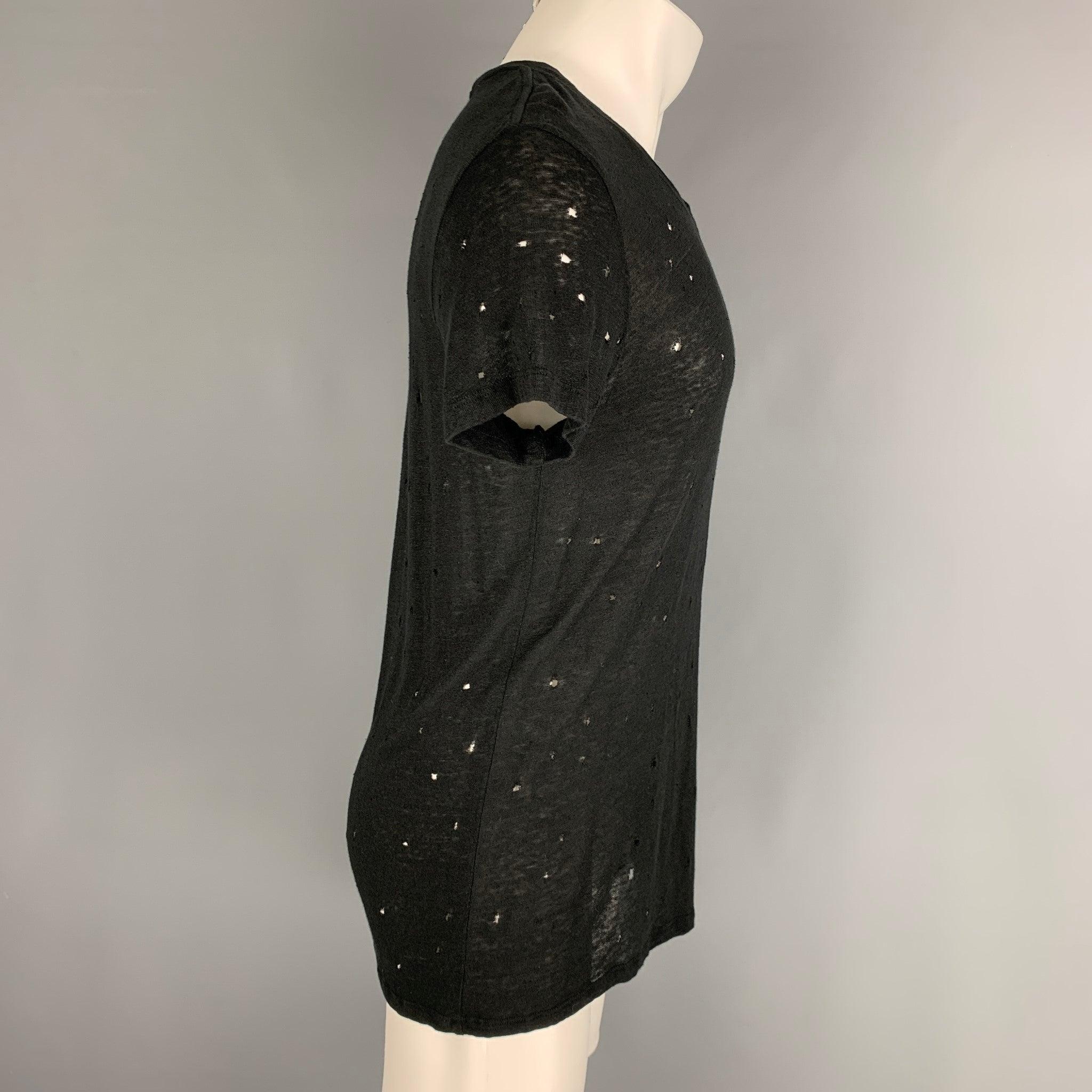 IRO 'Clay' t-shirt comes in a black linen featuring distressed details throughout and a crew-neck. Made in Portugal.Very Good Pre-Owned Condition. 

Marked:   XS 

Measurements: 
 
Shoulder: 18 inches Chest: 46 inches 2Sleeve: 8 inches Length: 26.5