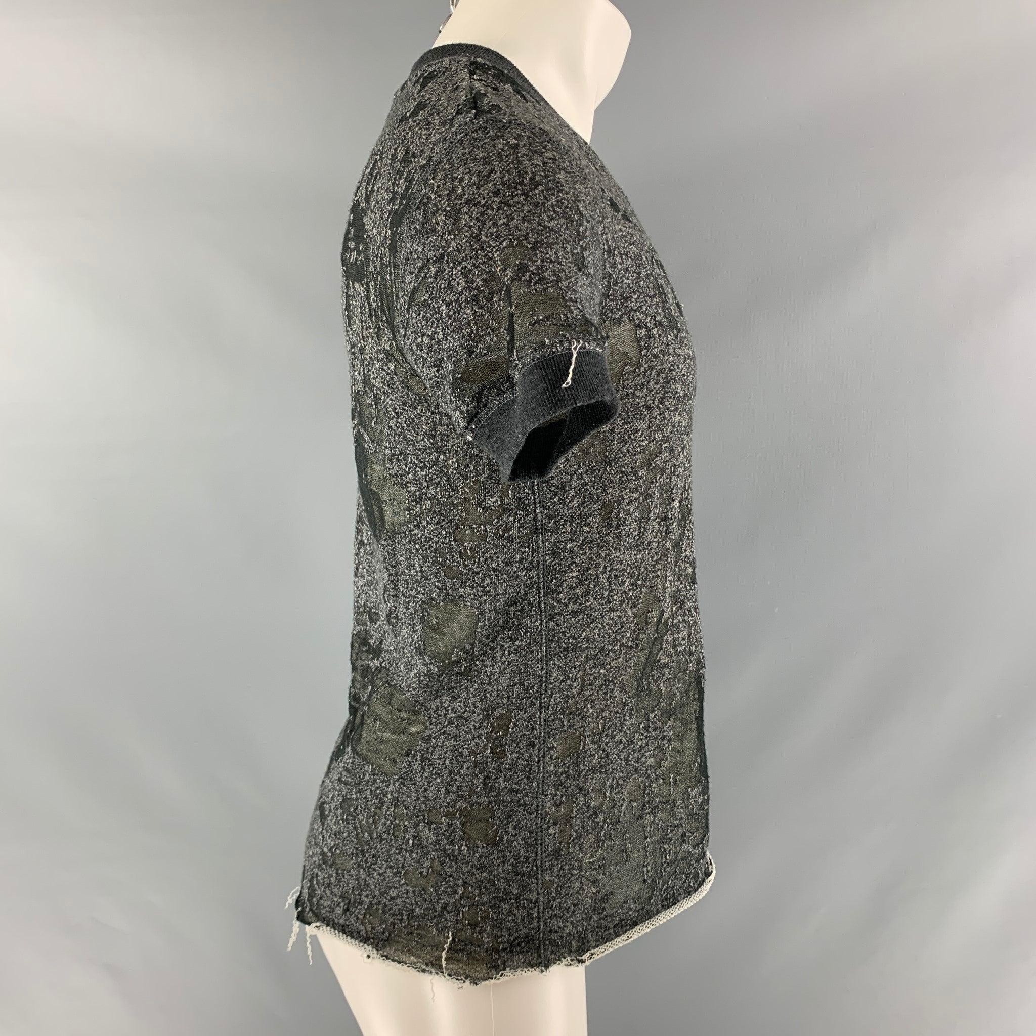 IRO JEANS T-shirt comes in dark gray cotton french terry knit featuring a crew neck, raw hem, and distressed style. Excellent Pre-Owned Condition. 

Marked:   XS 

Measurements: 
  
Shoulder: 18.5 inches Bust: 44 inches Sleeve: 7 inches Length: 26