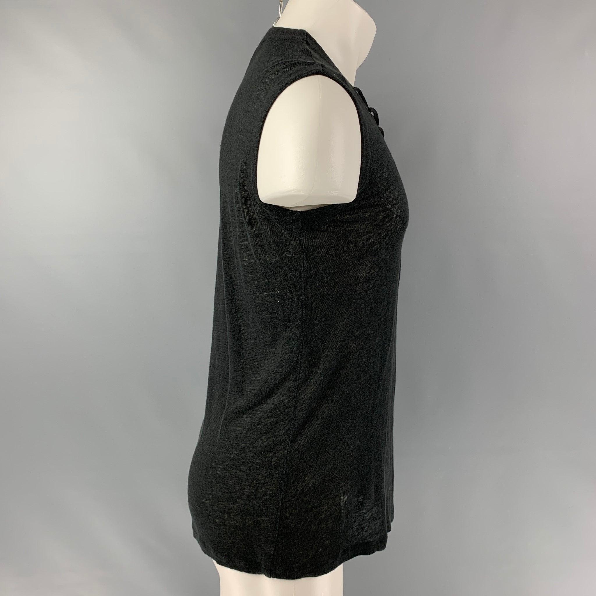 IRO JEANS Tissa tank top comes in a black partially see through linen jersey featuring a see laced chest detail and crew-neck. Made in Portugal.Excellent Pre-Owned Condition.  

Marked:   S 

Measurements: 
 
Shoulder: 18 inches Chest: 46 inches
