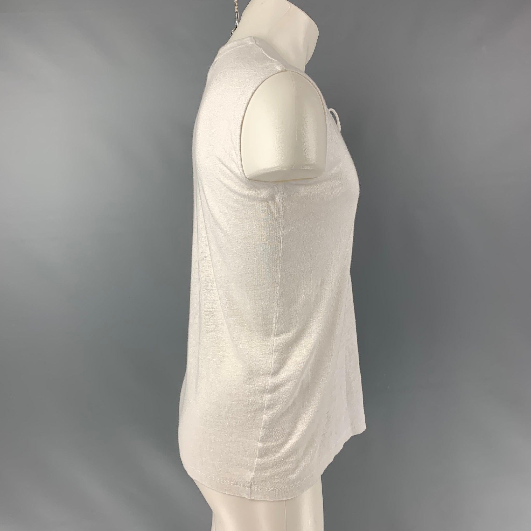 IRO JEANS Tissa tank top comes in a white partially see through linen jersey featuring a laced chest detail and crew-neck. Made in Portugal.Excellent Pre-Owned Condition.  

Marked:   XS 

Measurements: 
 
Shoulder: 17 inches Chest: 40 inches