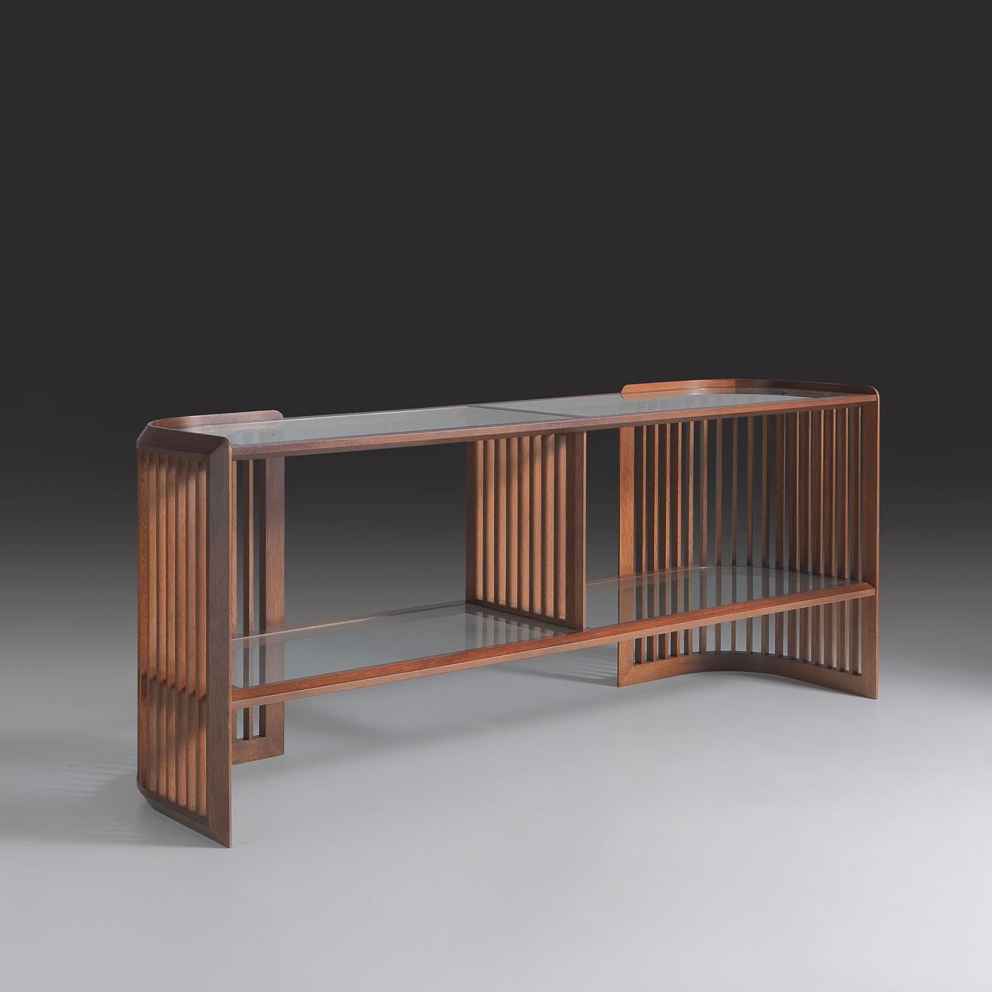 A testament to refined craftsmanship and modern elegance, this sideboard from the Italo Outdoor collection showcases a harmonious blend of Iroko wood and crystal shelves. Its light finish exudes a fresh, contemporary vibe, while the option of a