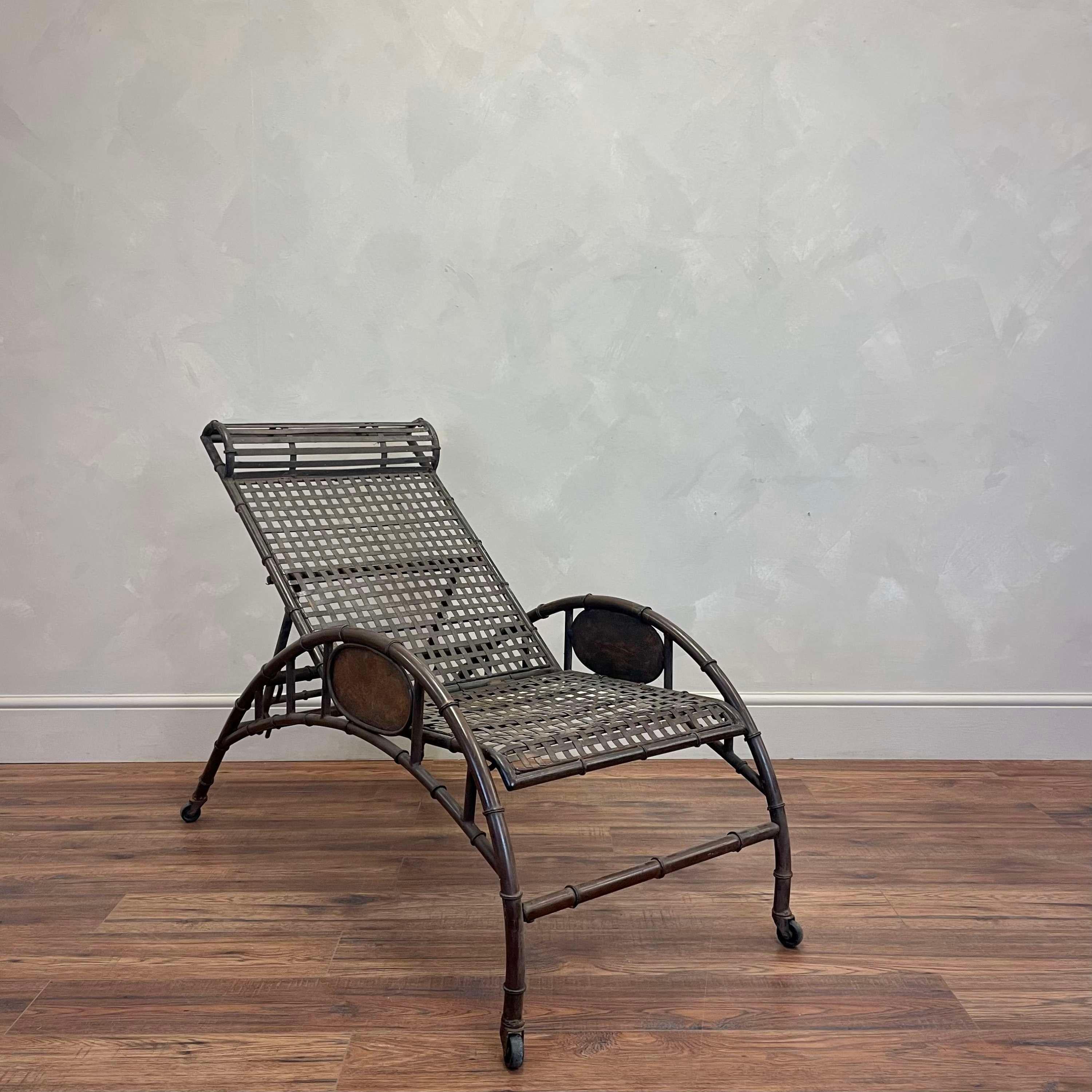1930s French faux bamboo style iron garden recliner 

Lattic style seat and back detail

We have never seen one like it before, this came from a private home in Marseille in the South of France 
Can be used indoors as a point of difference in