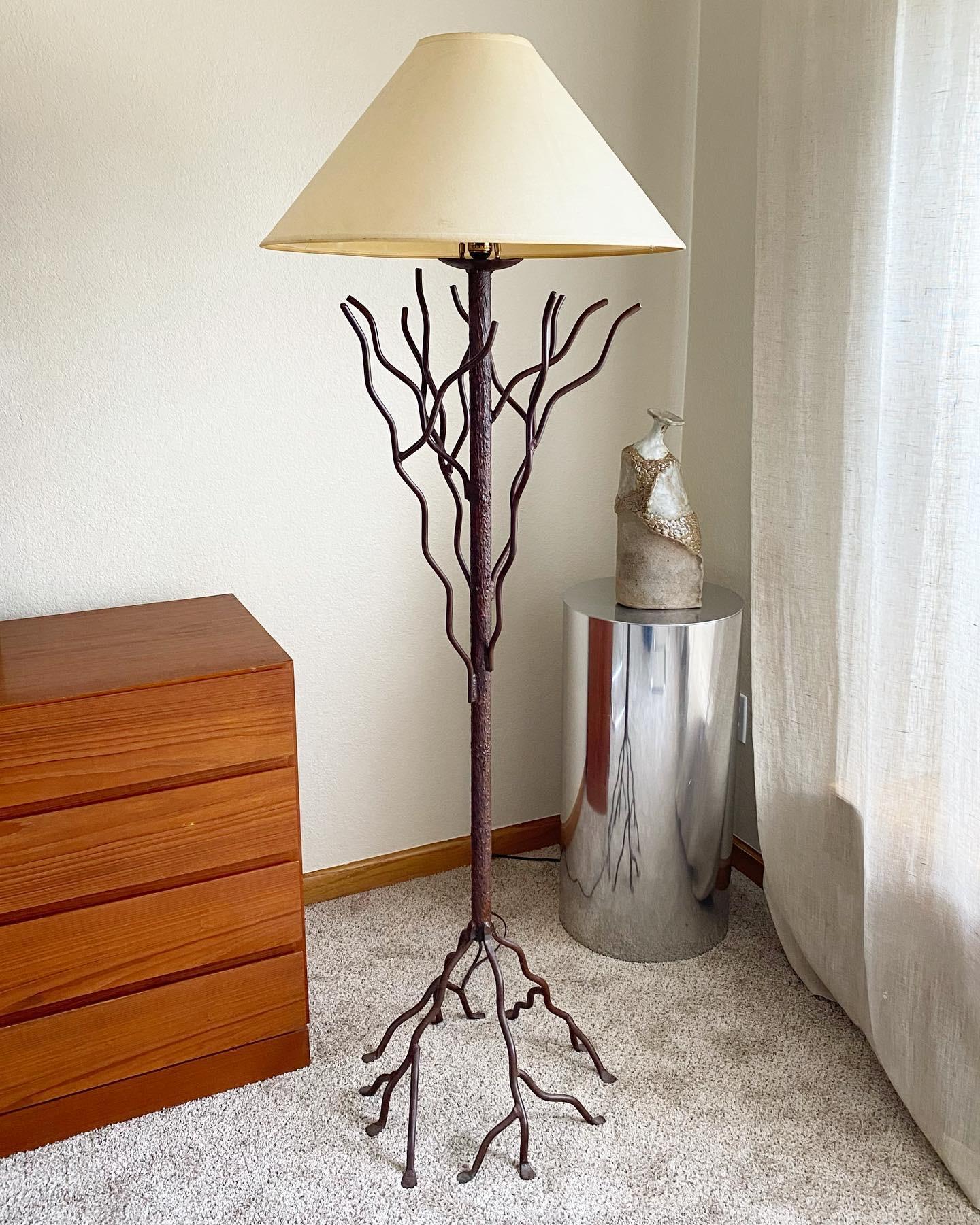 Extraordinary, one-of-a-kind artisan-crafted iron floor lamp. Beautifully resembles the natural textures of a tree with some freedoms taken to keep the piece feeling abstracted. Excellent condition with wear to shade only.

This would be lovely