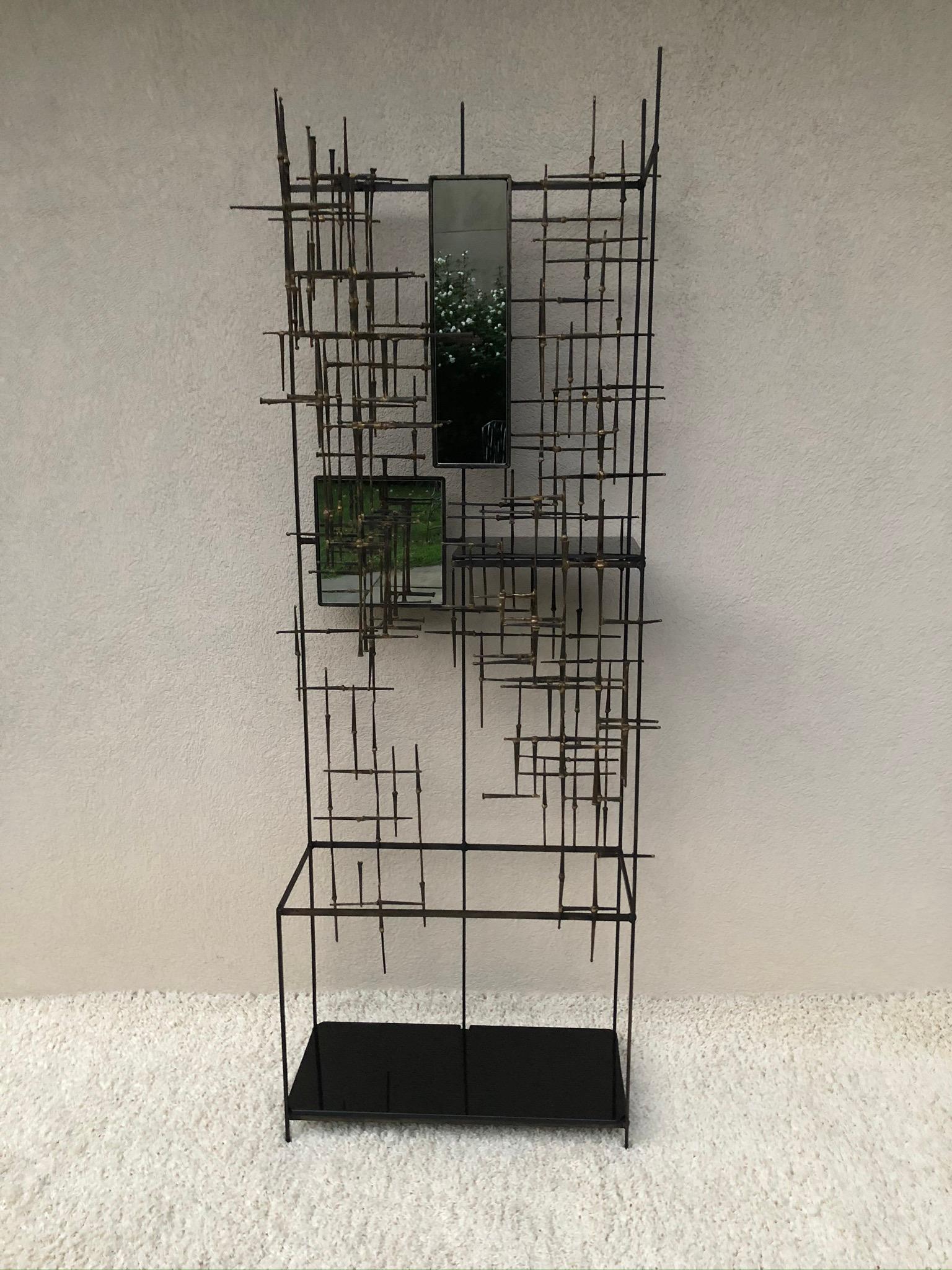 Tall modernist black iron and bronze soldered entrance umbrella stand, display piece, one of a kind sculpture,
Mirrored sections and black glass shelves, unique piece to accent a hallway or entrance.
  