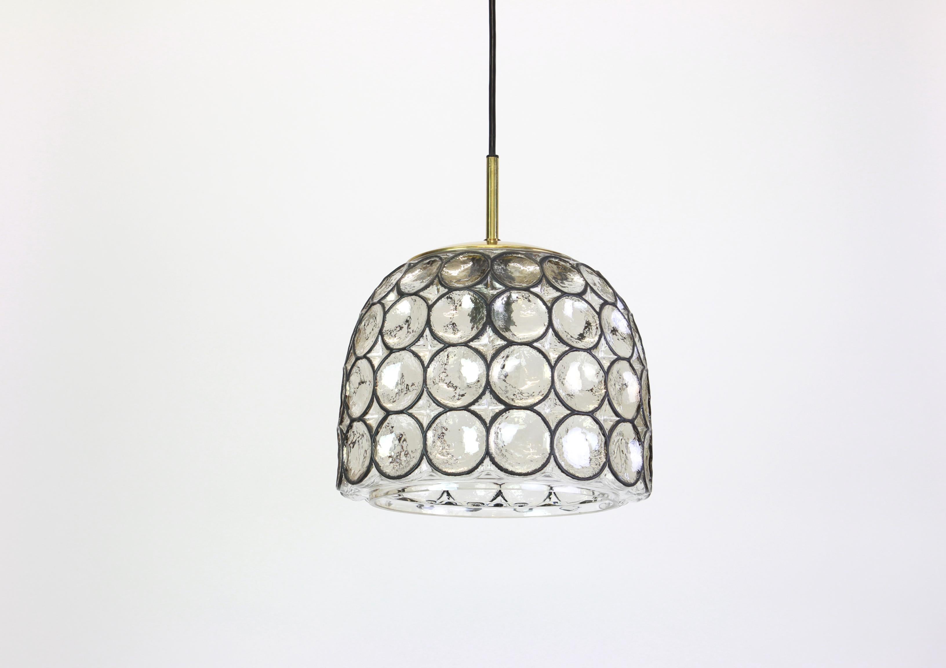Minimalist iron and clear glass pendant light manufactured by Limburg Glashu¨tte, Germany, circa 1960-1969. 

Heavy quality and in very good condition. Cleaned, well-wired and ready to use. The fixture requires 1 x E27 Standard bulbs with 100W max