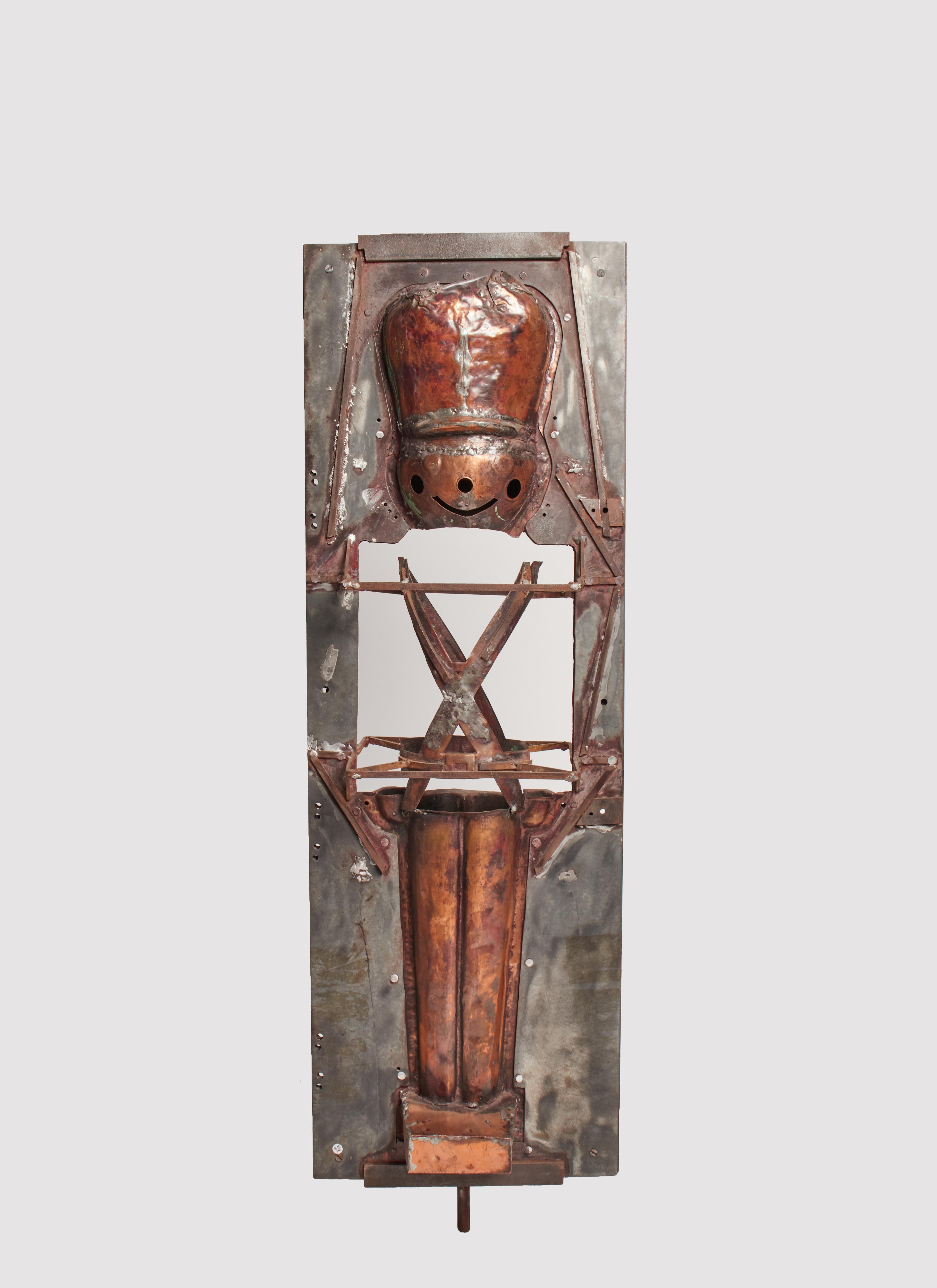 Large iron and copper mold used to make a children's toy depicting a soldier. United States of America, early 20th century.