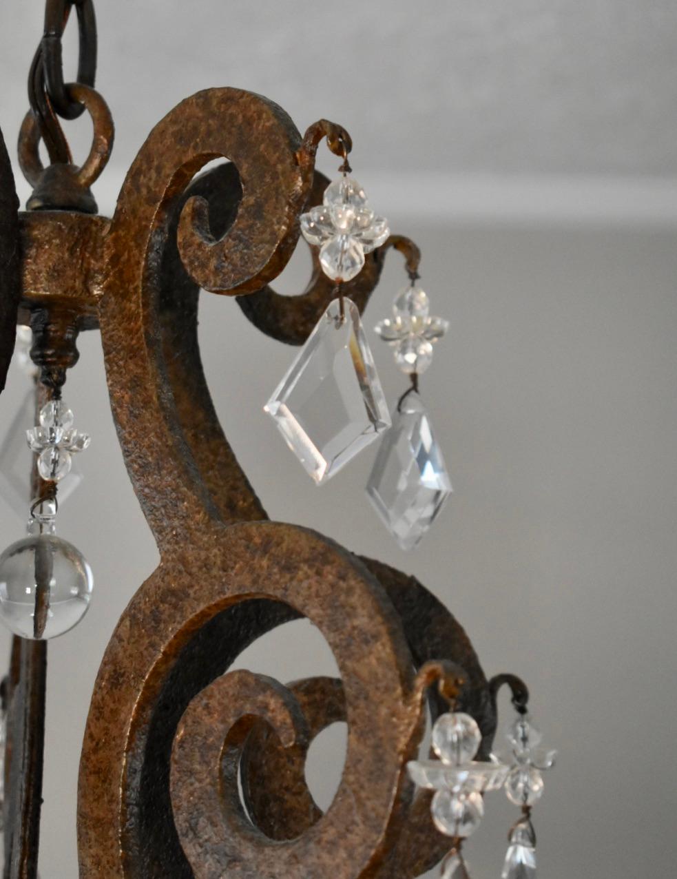Patinated Iron and Crystal Chandelier For Sale