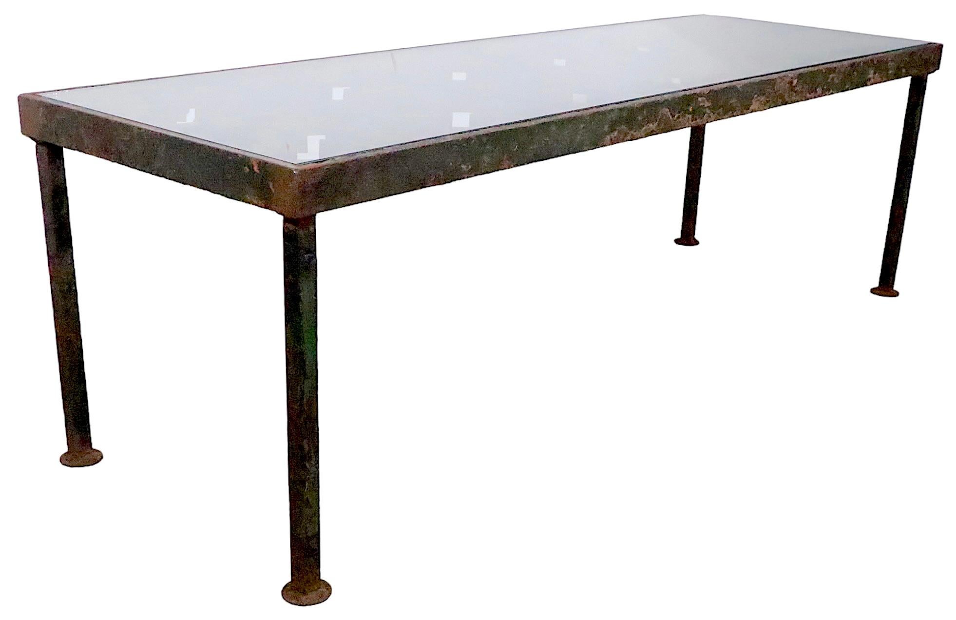 Iron and Glass Coffee Table created from a decorative  architectural iron panel In Good Condition In New York, NY