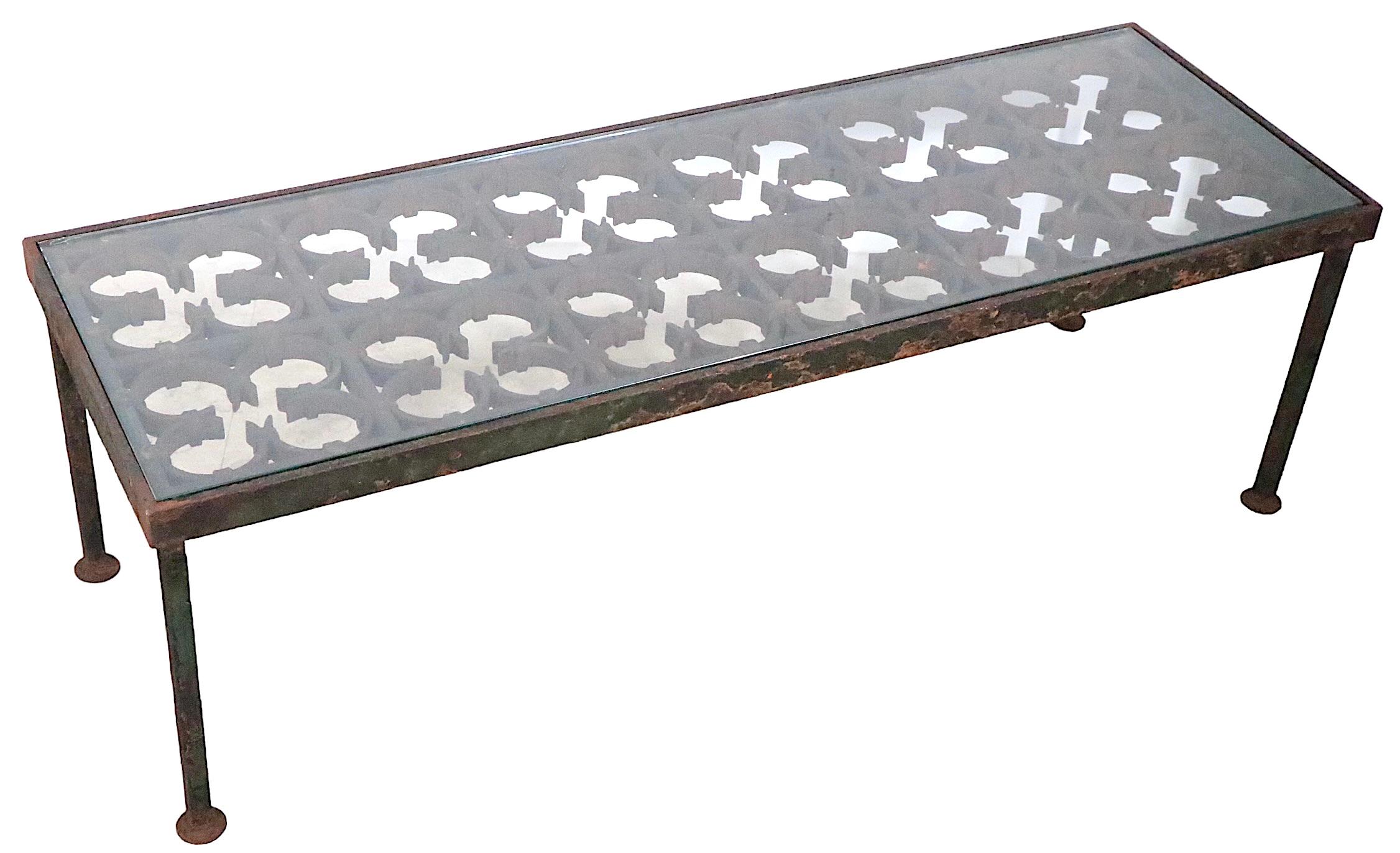 Iron and Glass Coffee Table created from a decorative  architectural iron panel 1