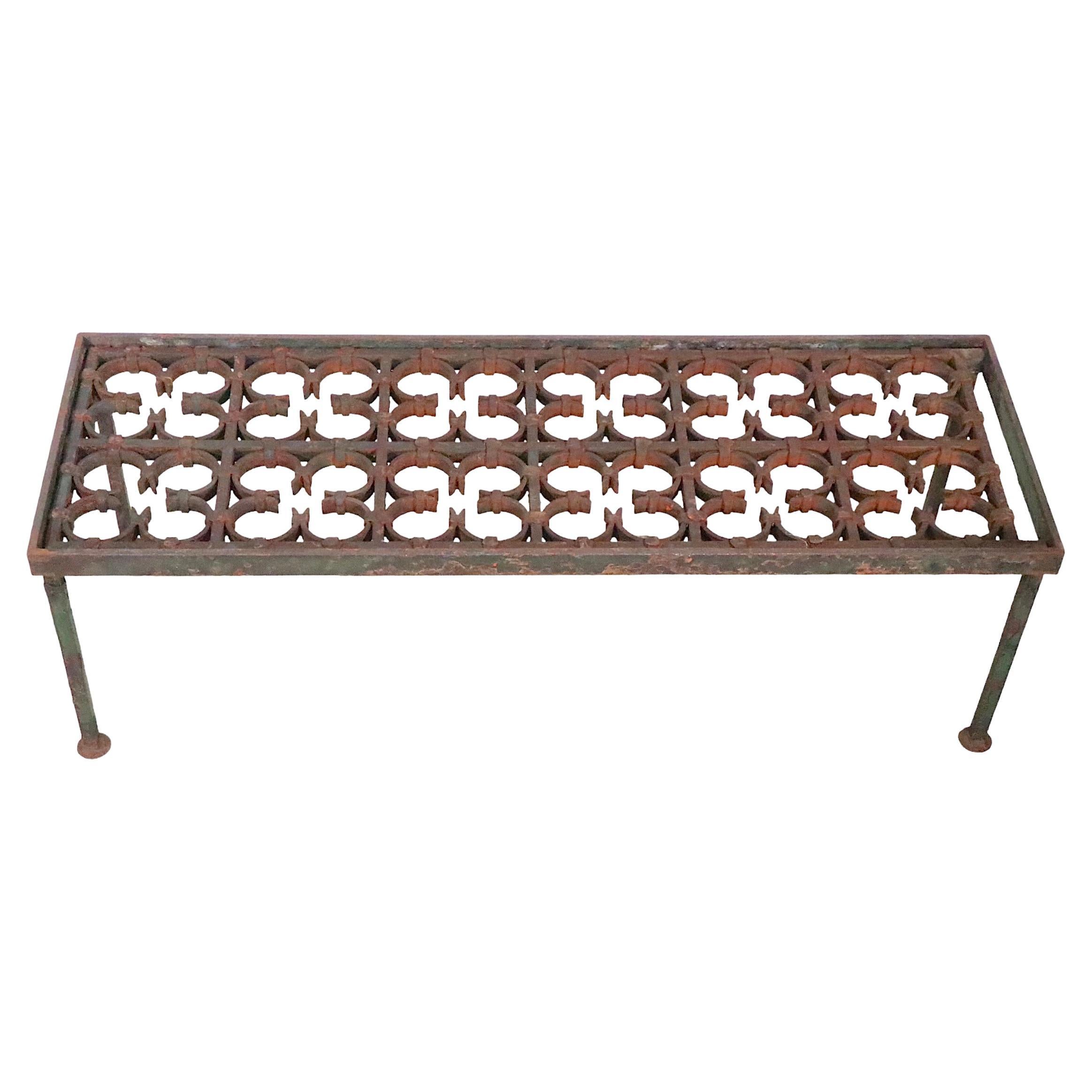 Iron and Glass Coffee Table created from a decorative  architectural iron panel