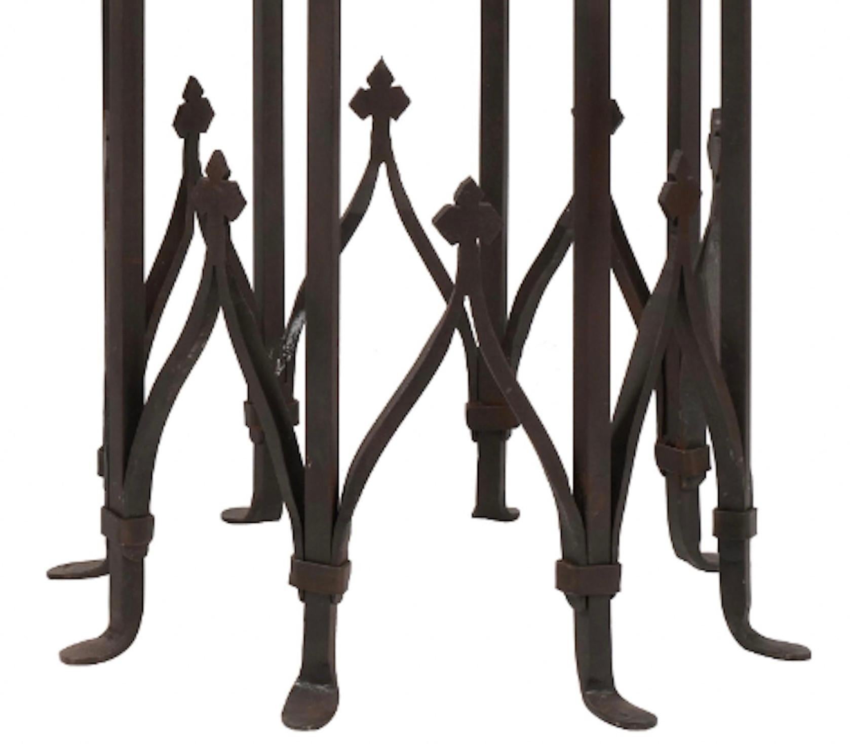 Gothic style, hand forged iron gueridon table base with detached, double layered, Breccia marble top.  