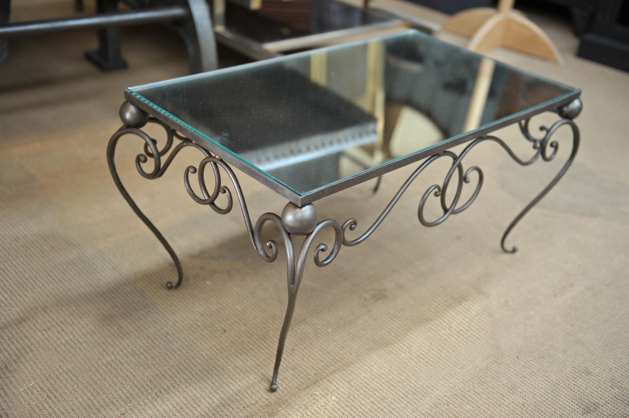 Very nice French iron work base with mirro top coffee table circa 1940 all in excellent condition.