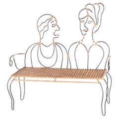Iron and rattan bench