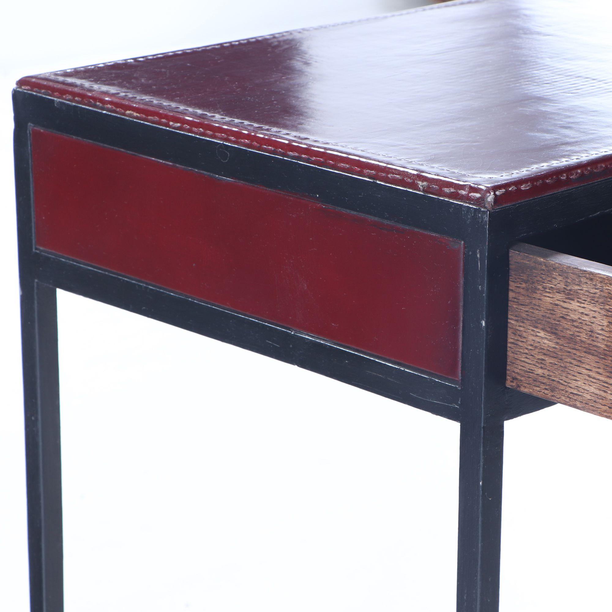 South American Iron and red leather writing desk with two drawers, manner of Jean-Micheal Frank For Sale