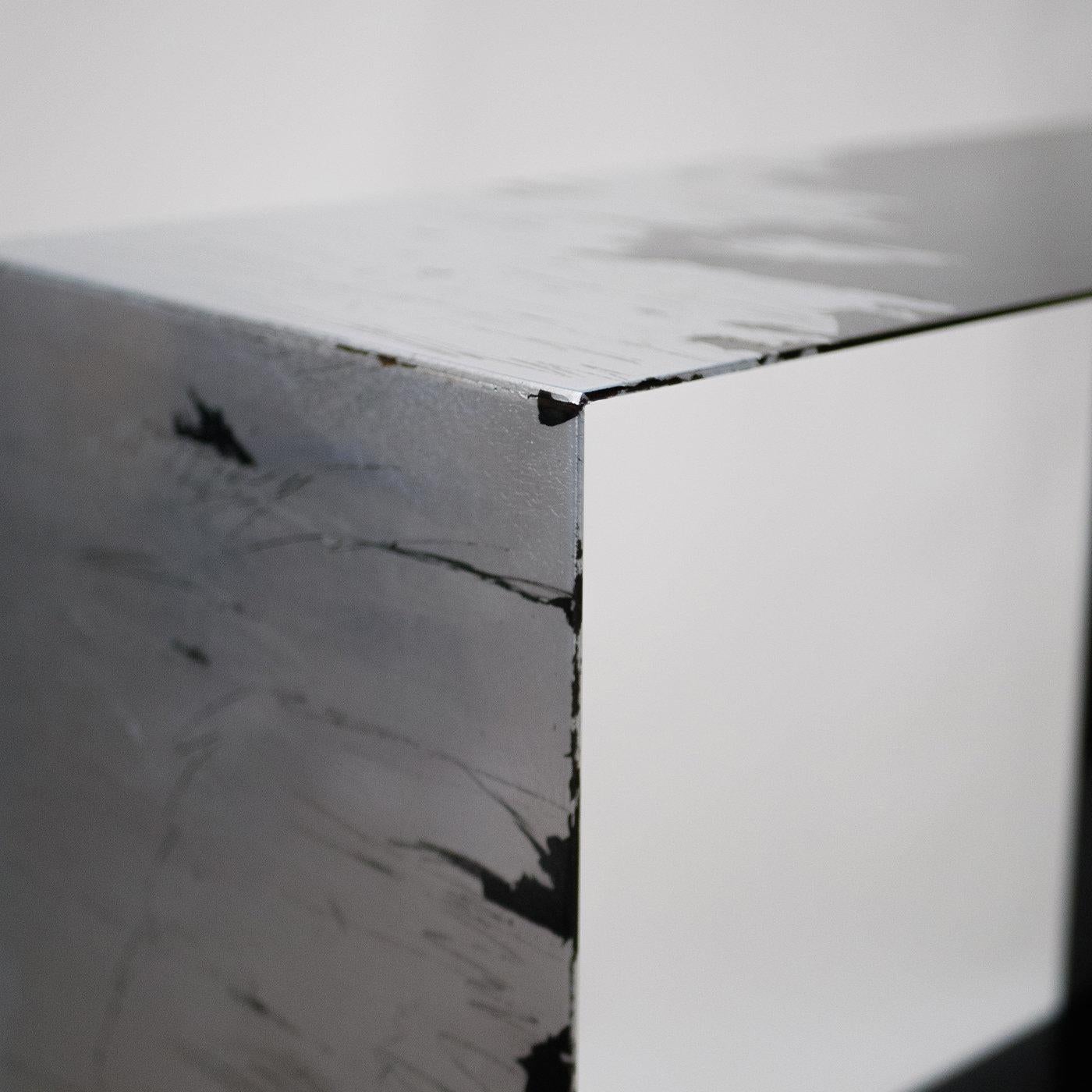 Inspired by contemporary art, this breath-taking console handcrafted from iron is the epitome of industrial-chic style. Its silhouette is marked by clean lines and enhanced by polyester-based, transparent varnishes that lend it a characteristic