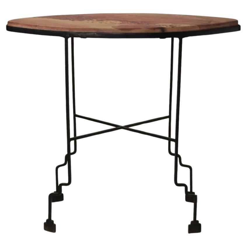 Table en fer et en pierre en vente