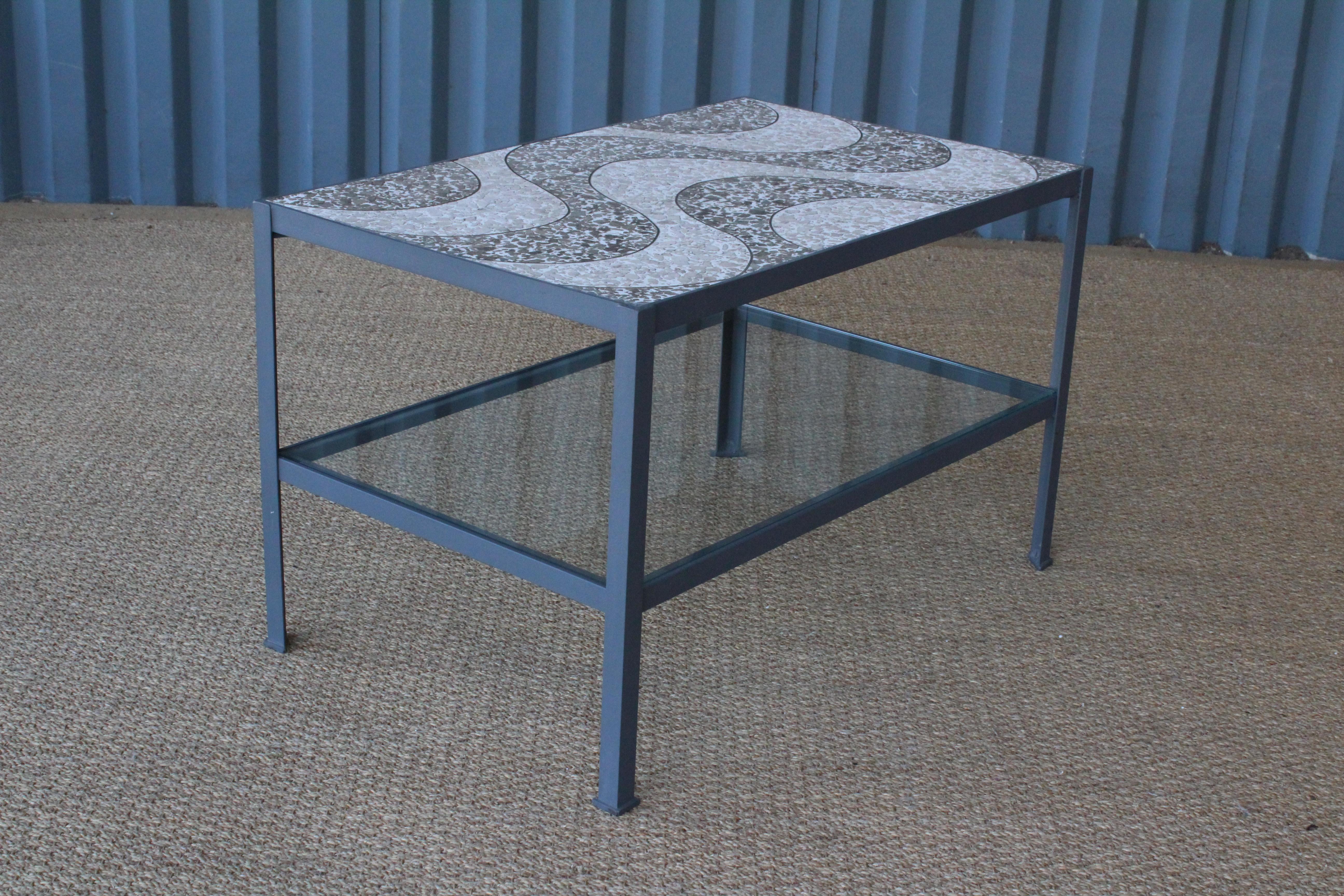 Terrazzo top end table on a grey iron base with glass shelf. Base is custom made to fit the vintage terrazzo wave patterned top.