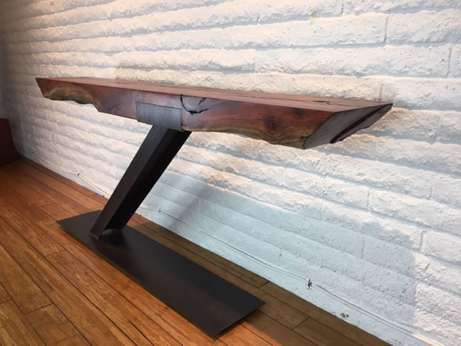 Eucalyptus iron and wood table console, sofa or hallway table designed and produced by master wood artist, designer, and maker Scott Mills who only uses reclaimed (deadfall or storm downed trees) in the pieces he produces. This piece is solid