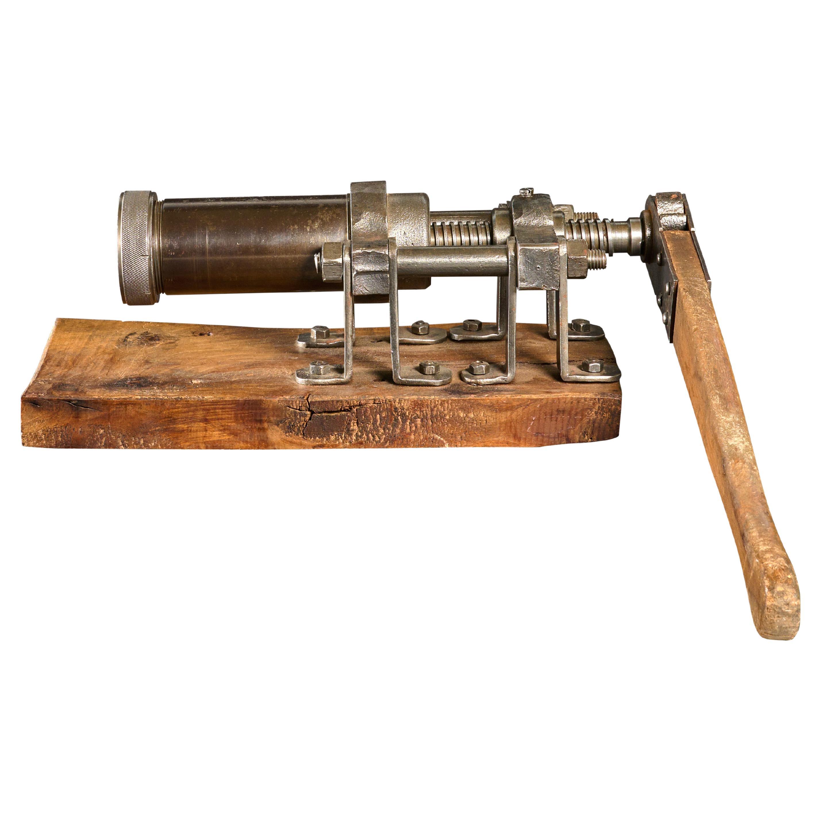 Cast Iron Book Press with Brass Handle and Newer Wood Base For Sale at