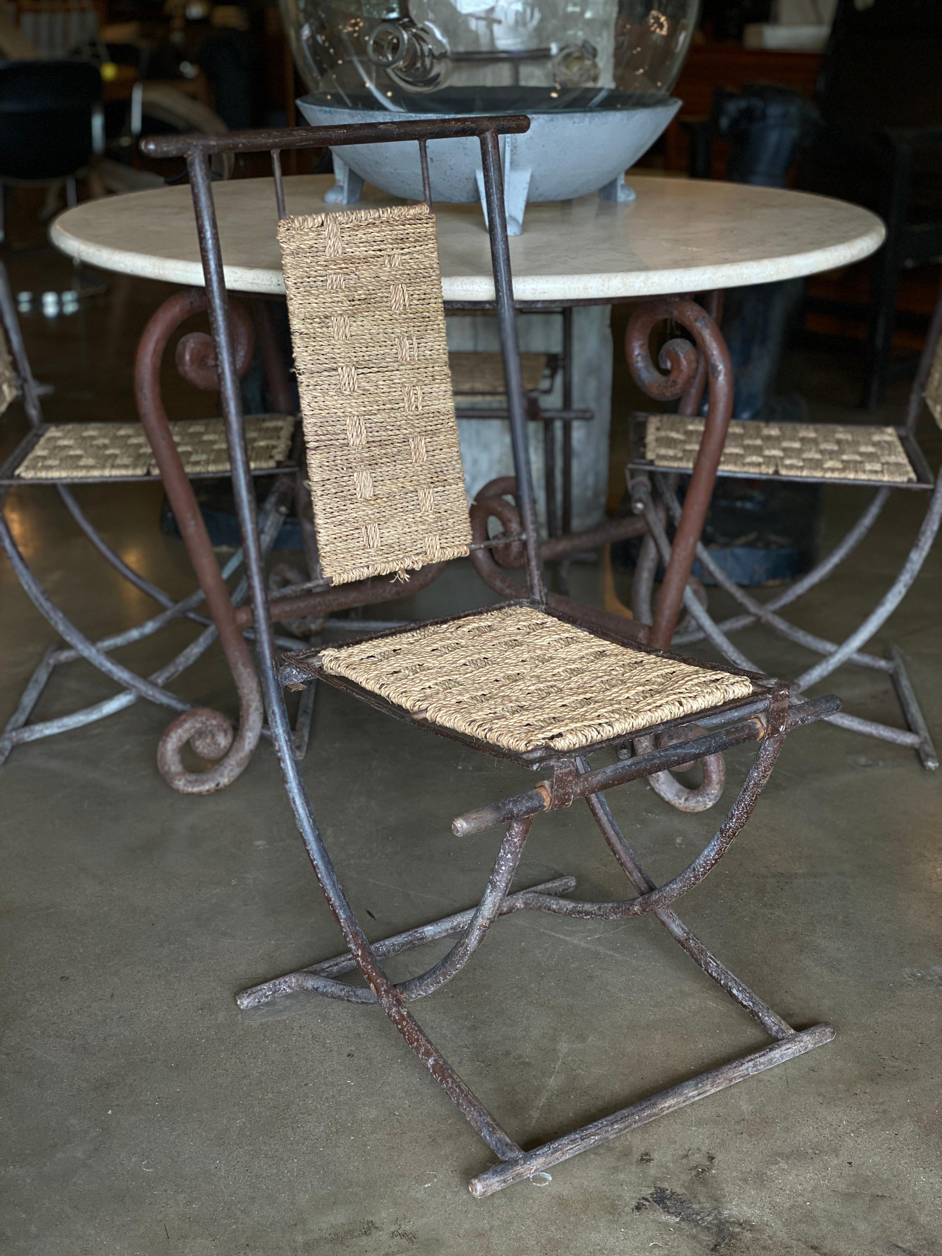 Iron framed dining chairs with basket weave style seats and backs. Sturdy and comfortable. Folding chairs can compress and Stand for storage. Set of 4. France, 1930s-1950s.

See table listing: LU1140215015672.