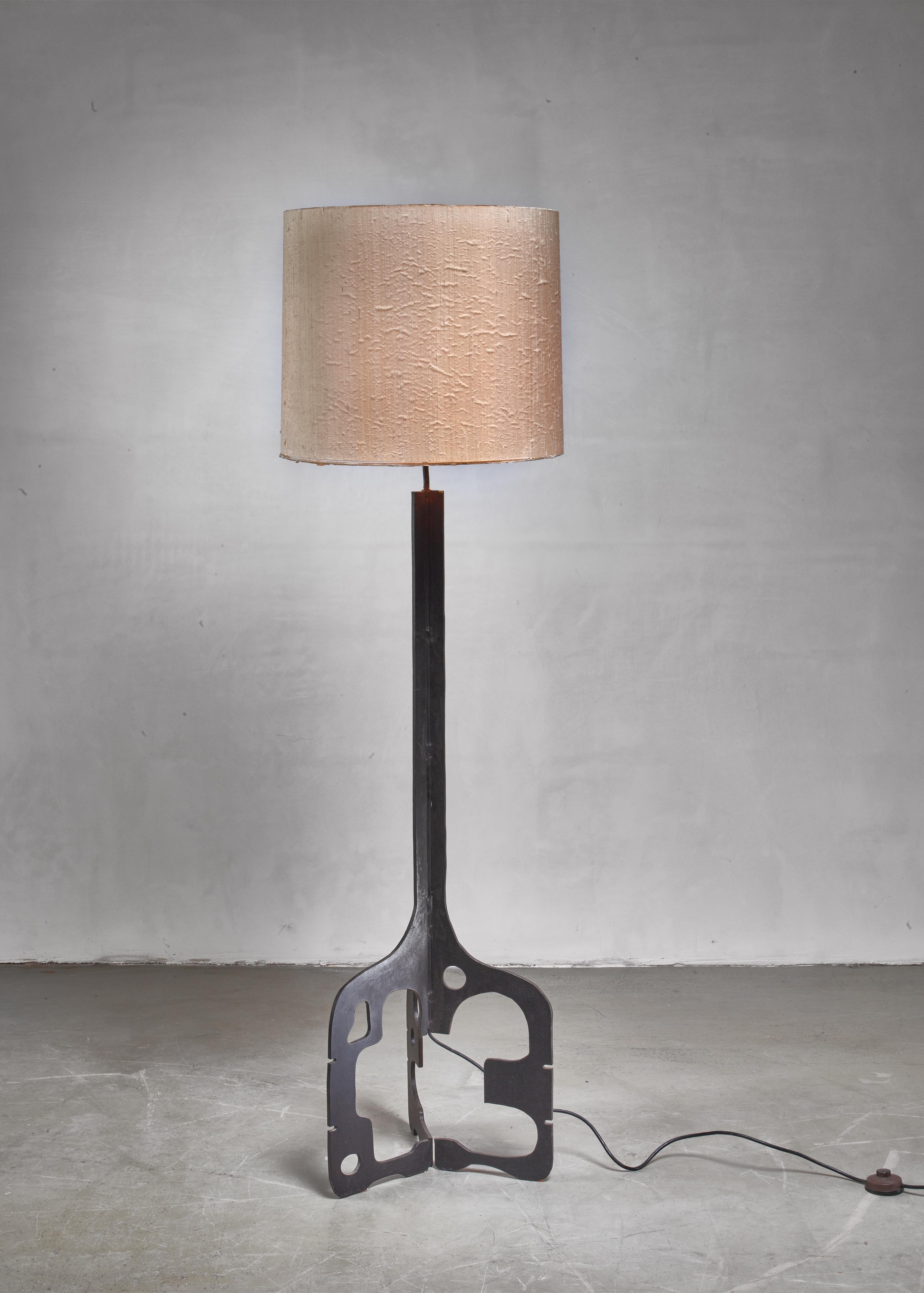 A 1950s German black iron floor lamp on a sculptural triform base.
The measurements and price stated are of the lamp without a shade.
Shade available on request.

 
 