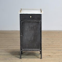 Iron bedside table, circa 1920