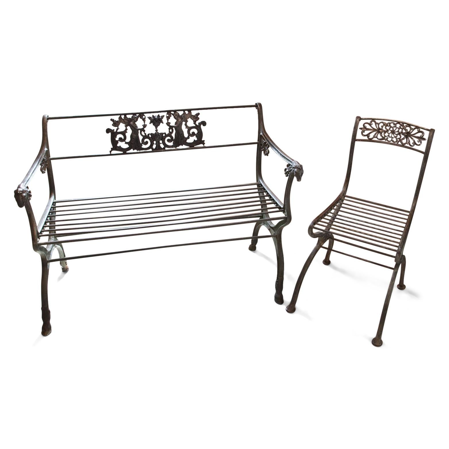 Iron bench with a central motif, the armchairs and in horses’ heads and the feet correspondingly in hooves. The backrest originally had two motives but it had been remodeled and a single motif placed in the centre. Old restorations. See Lit: Georg