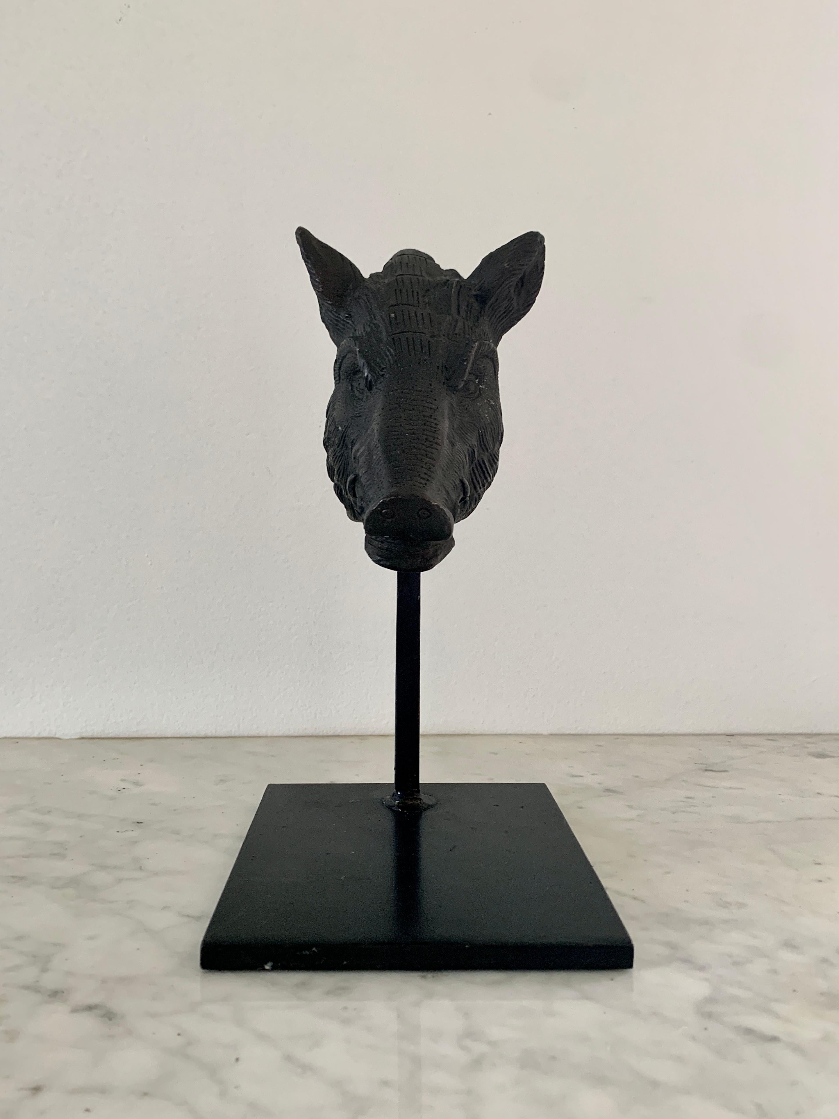 A stunning bust of a boar's head mounted on a custom stand

20th Century

Forged iron bust, on custom steel stand

Measures: 5