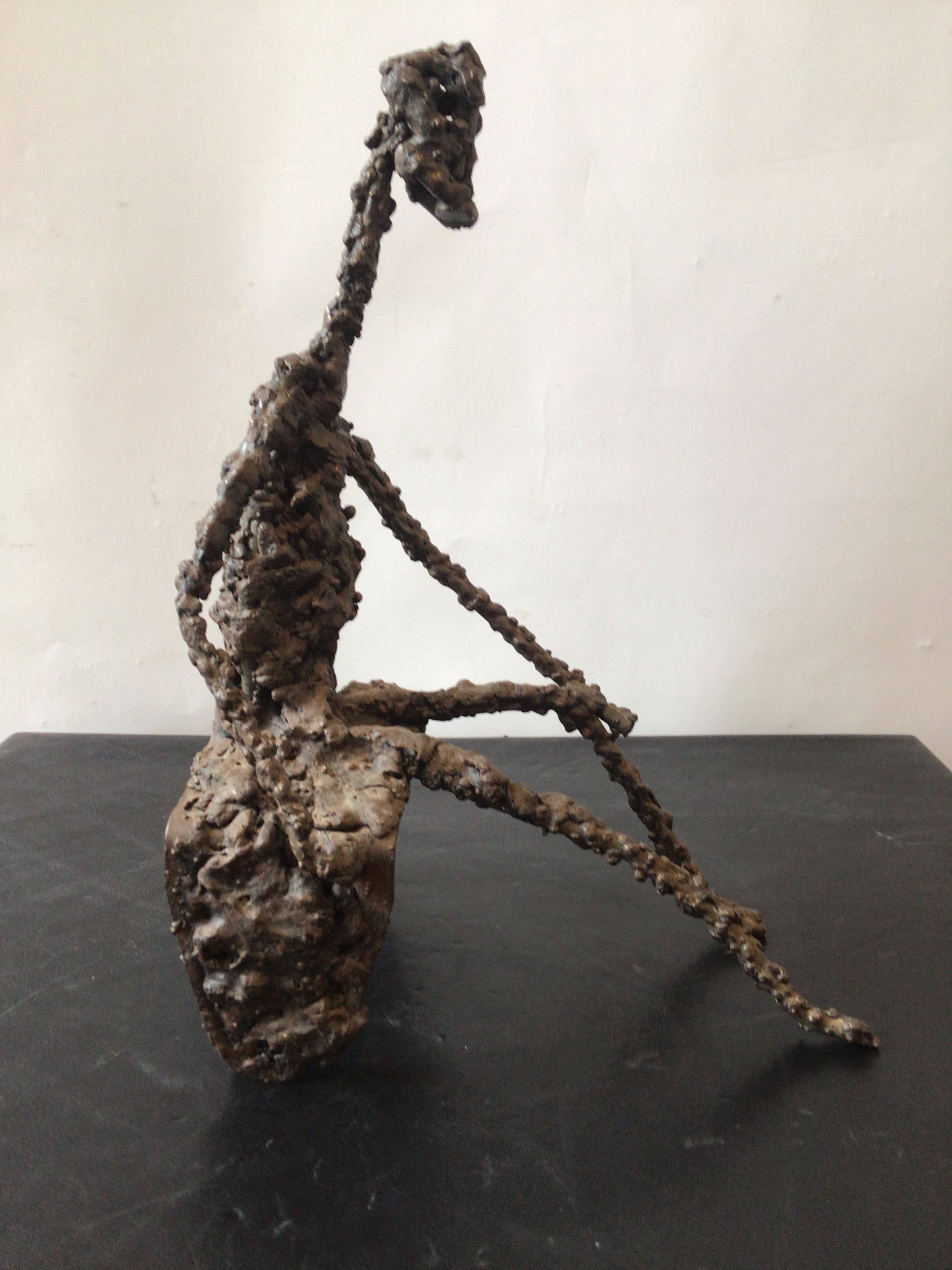 Iron Brutalist Sculpture of Seated Man 1