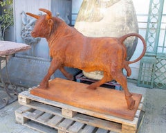 Iron bull sculpture with base and rust finish