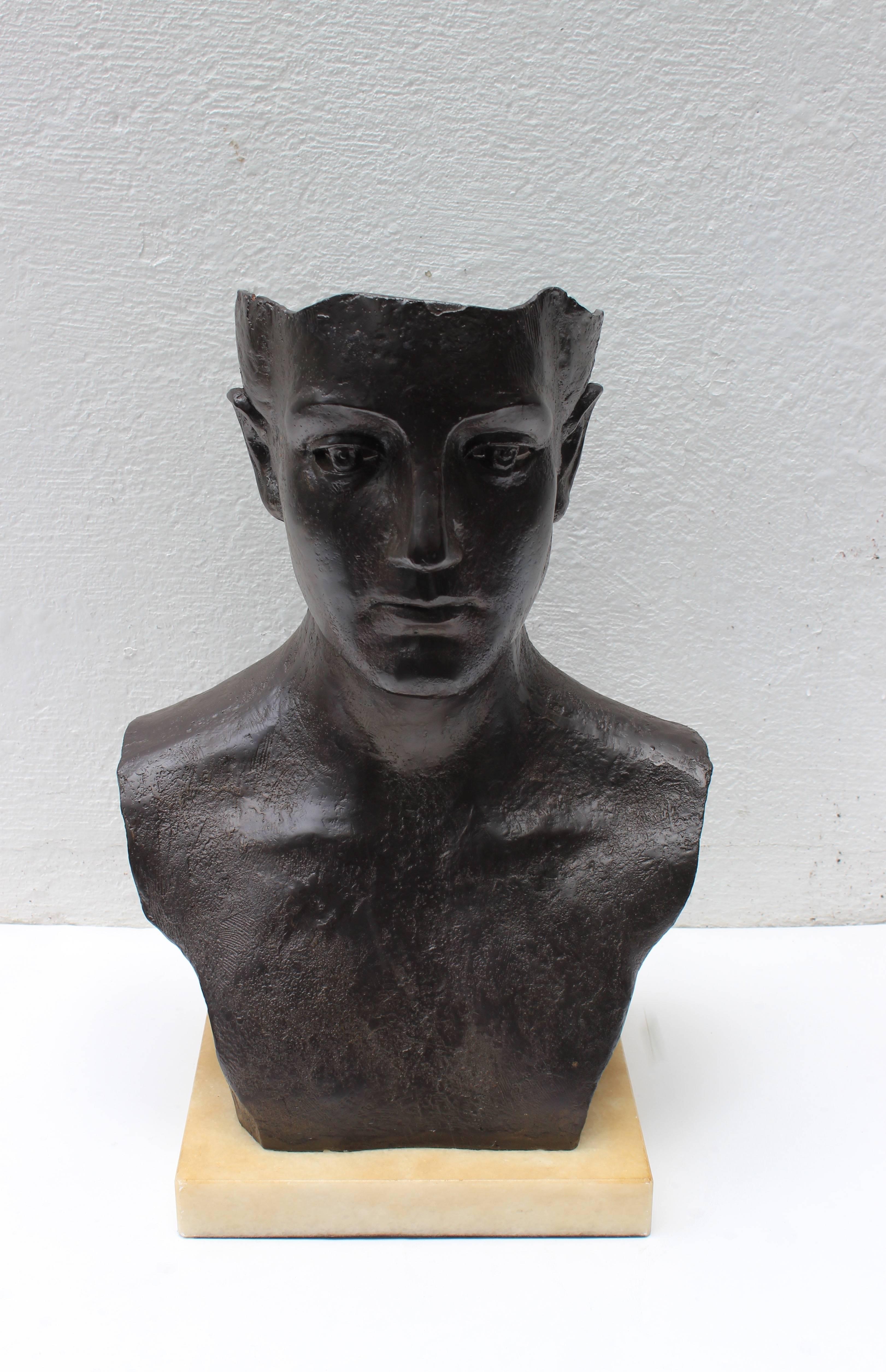 Iron bust sculpture mounted on stone base... not signed, artist unknown...
Base measures: 10.25