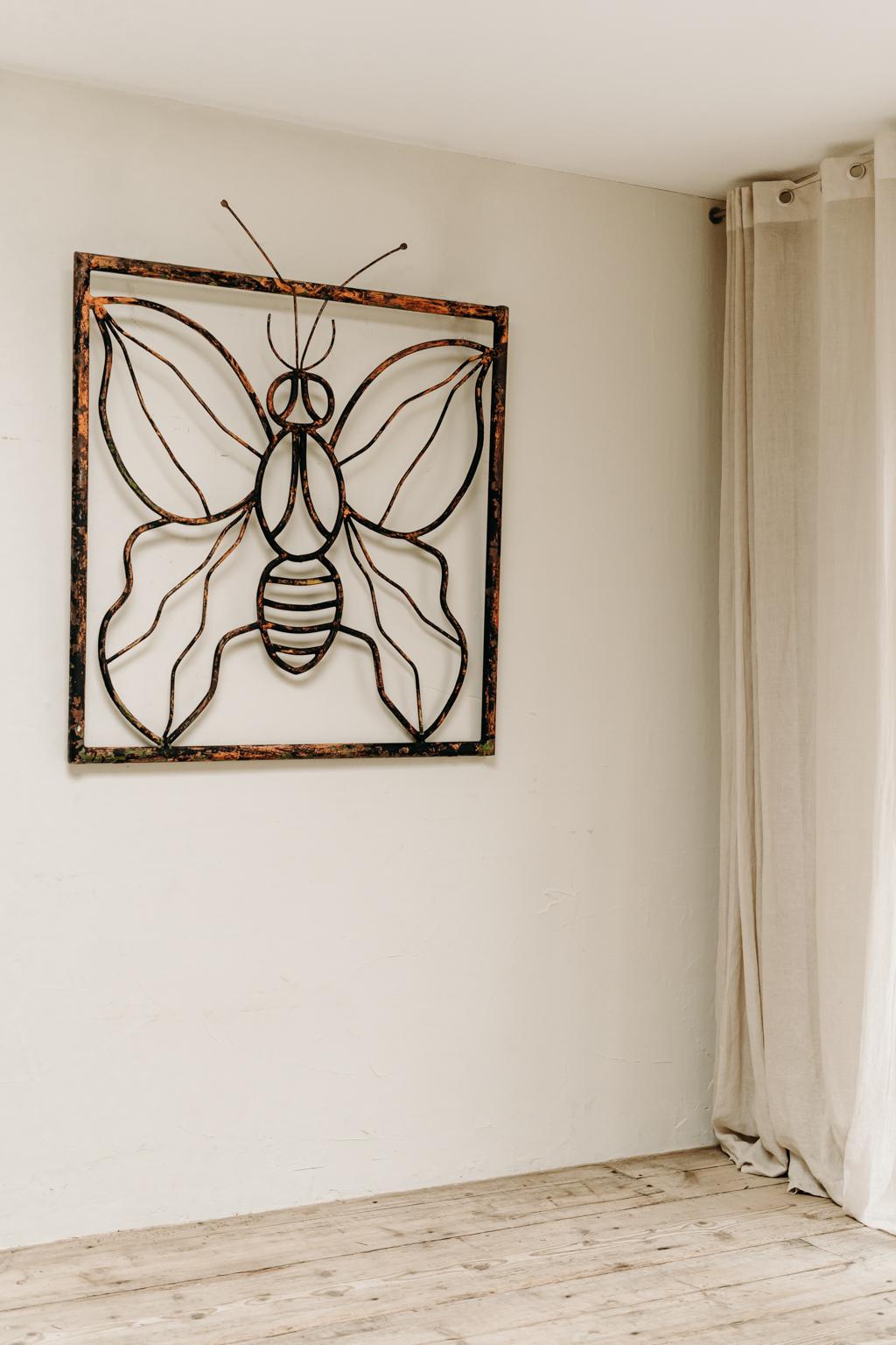 great quirky object ... this iron framed butterfly ... can be used indoors as well as outdoors ...