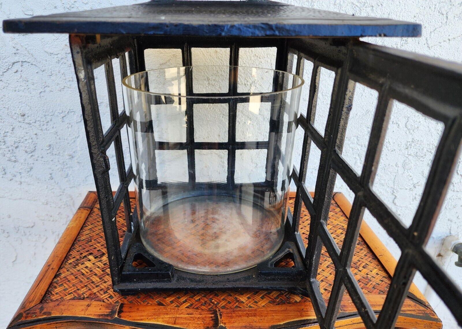 For FULL item description click on CONTINUE READING at the bottom of this page.
Huge Mid-Century Iron Candle Lantern 
Can rest on a table or hang and comes with original wavy blown glass candle holder.
We have 4 of the large ones and 3 smaller ones