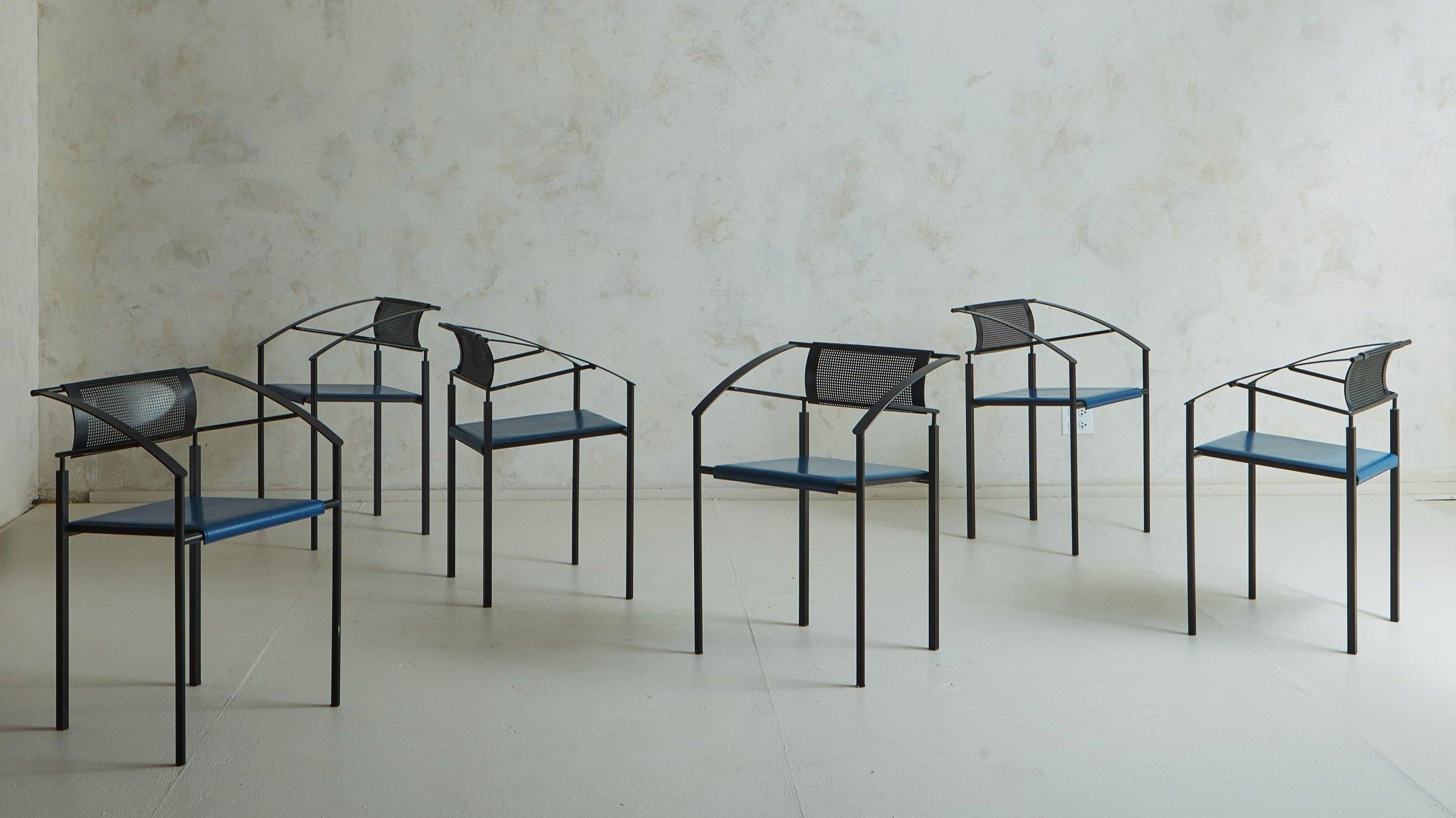 A postmodern Italian ‘Carrè VI’ chair by Fly Line. This striking chair features a black iron frame with angular arms, tubular legs, and a curved rectangular perforated metal seat back. It retains its original blue leather seat with stitch detailing