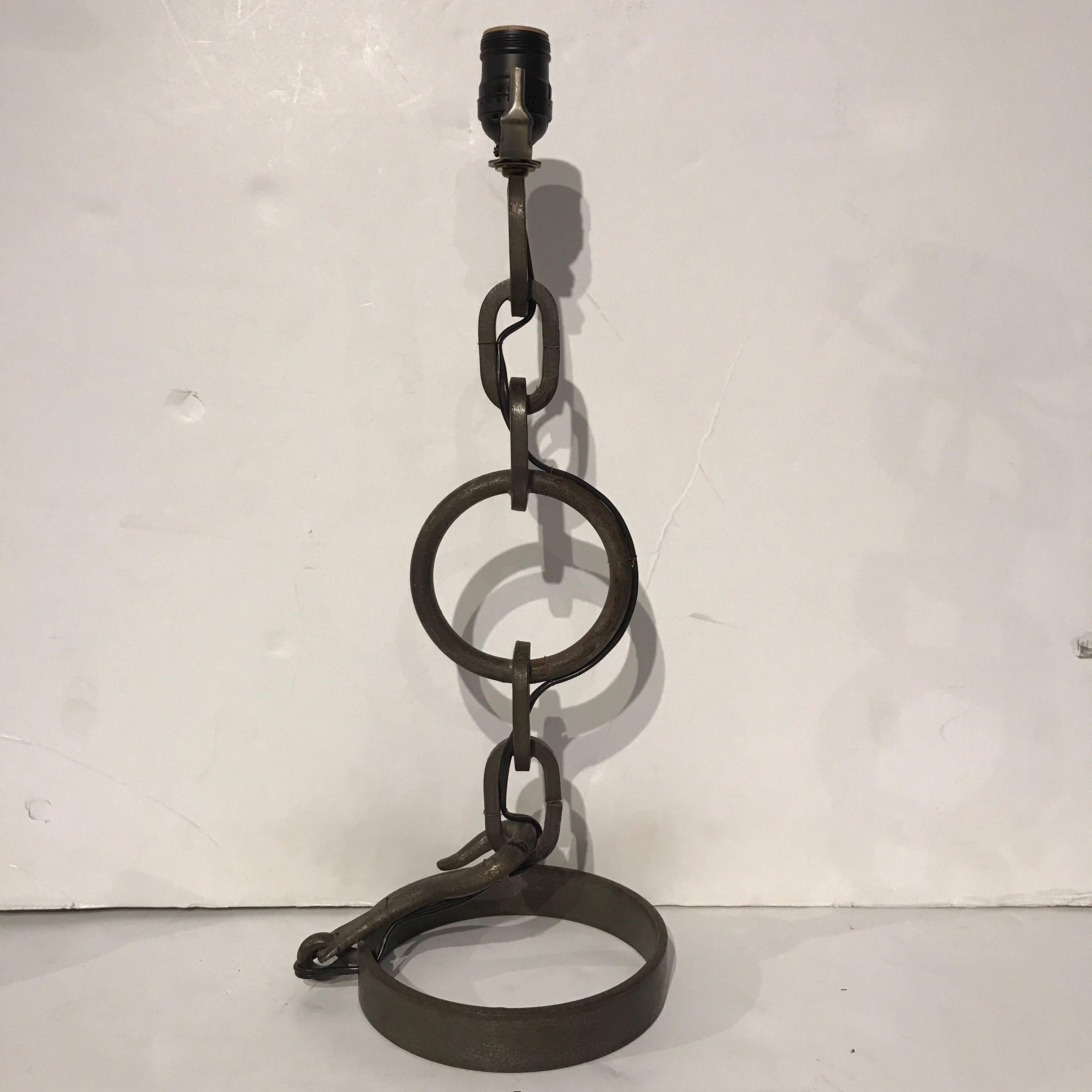 Iron chain link lamp by Jacques Adnet vertical iron chain links, very heavy and great scale. Excellent vintage condition, Stamped JA. Newly French wired.
Measures: 16