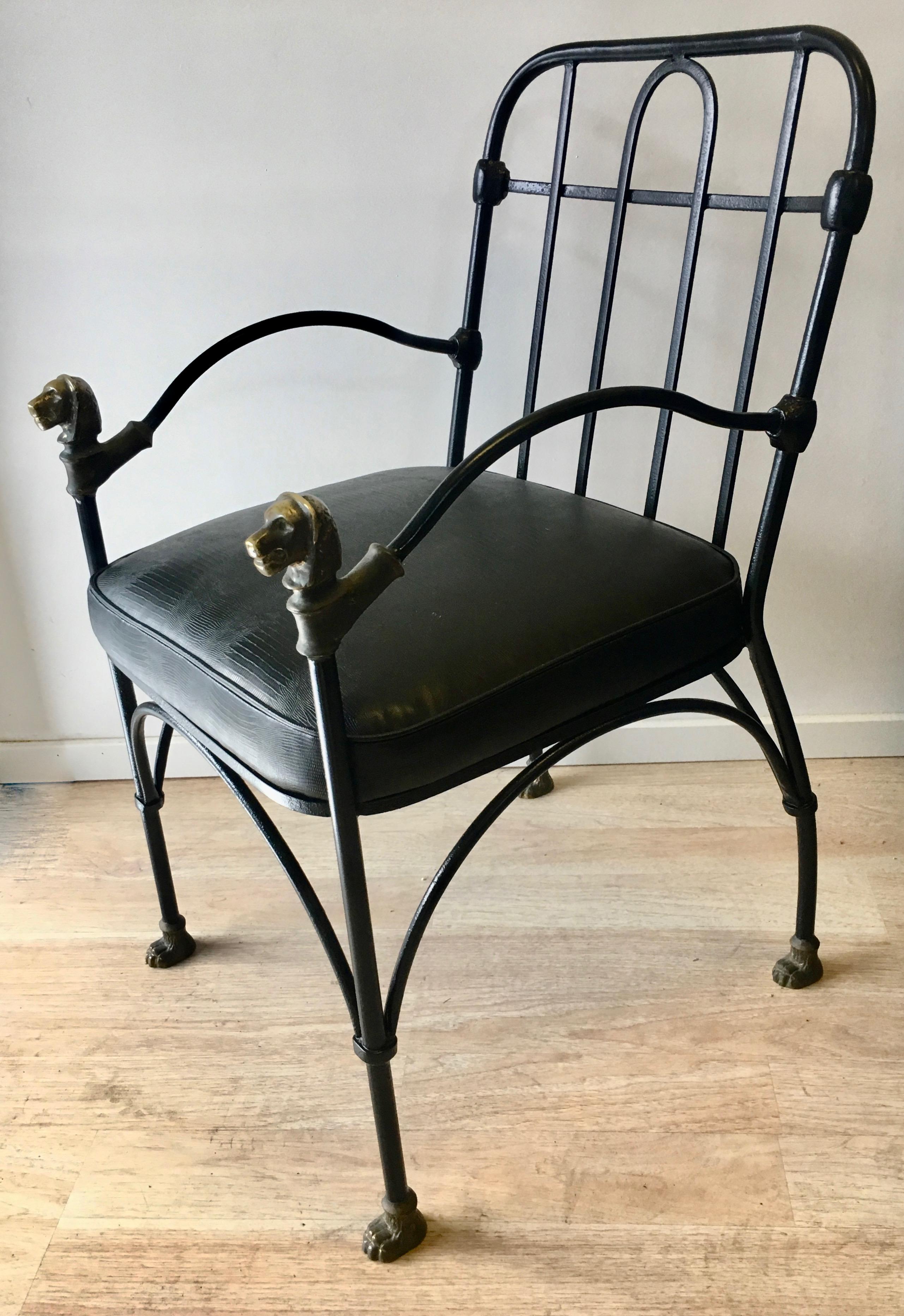 Wrought iron chair with bronze lion head detail - A handsome chair newly restored and upholstered - (If you have your own personal desired fabric, the seat is easily re-upholstered to your decor) - The wrought iron, in the manner of Italian artist