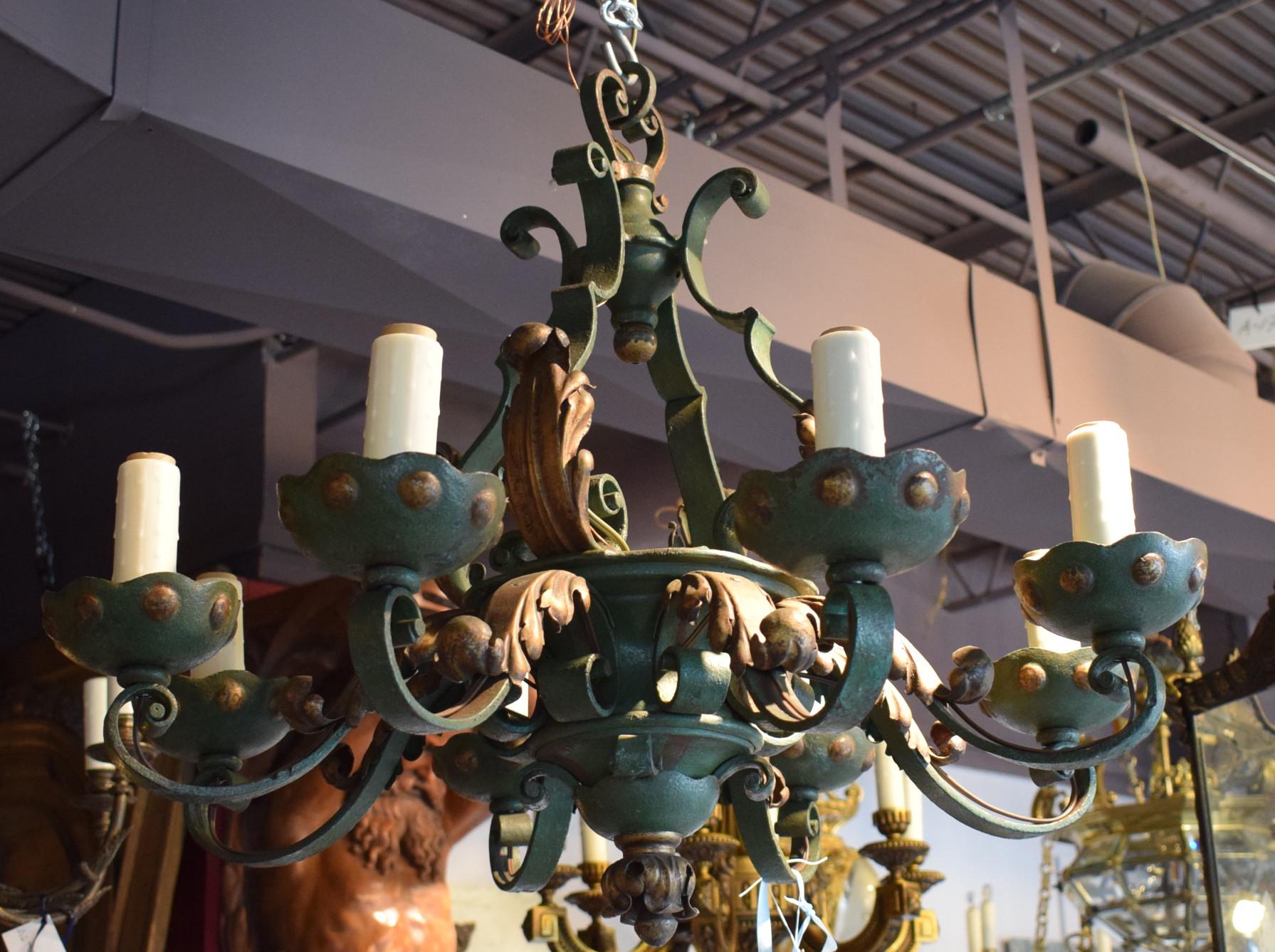 A fine and elegant iron chandelier. Original green and gold patina. 8-light, France, circa 1920
Dimensions: Height 24