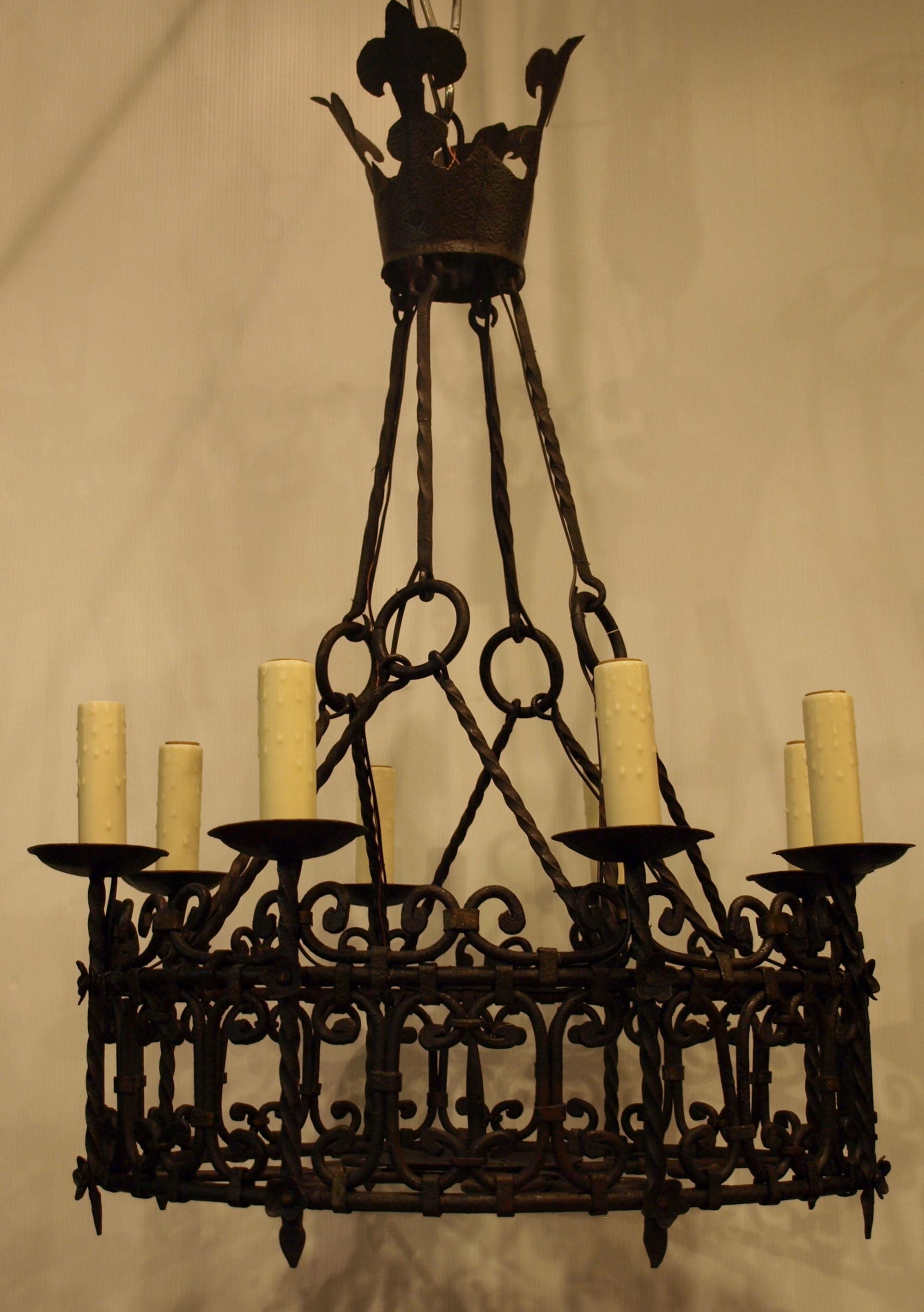 A very fine French provincial iron chandelier. Exquisite, delicate and highly skilled ironwork. Likely created to be used with candles, now electrified. France, circa 1890.
8 lights
Dimensions: Height 36