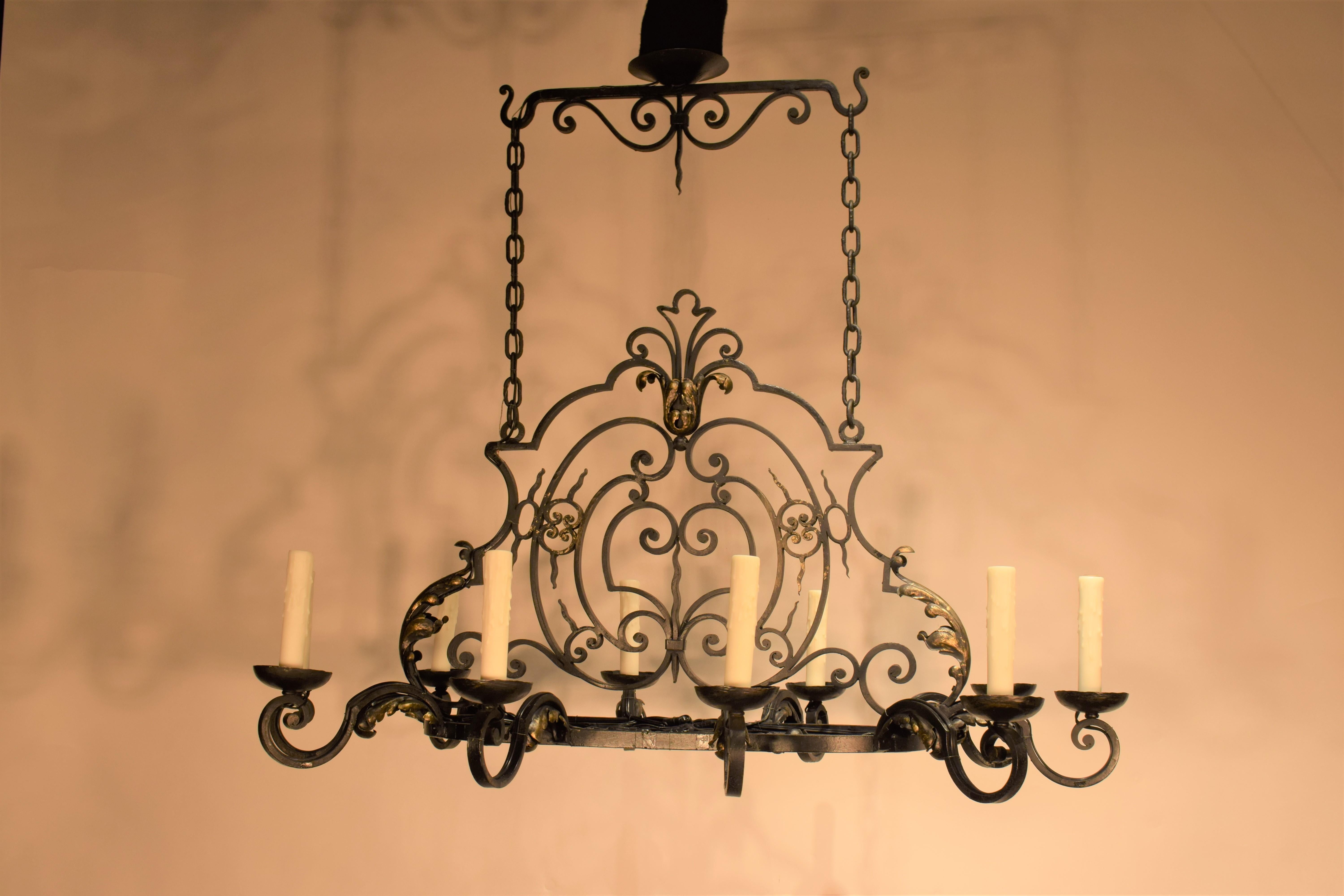 A Very Fine Hand-Hammered Louis XIV style Iron Chandelier. Exquisite Detail. 
10 lights. France, circa 1910.
Dimensions: Height 37
