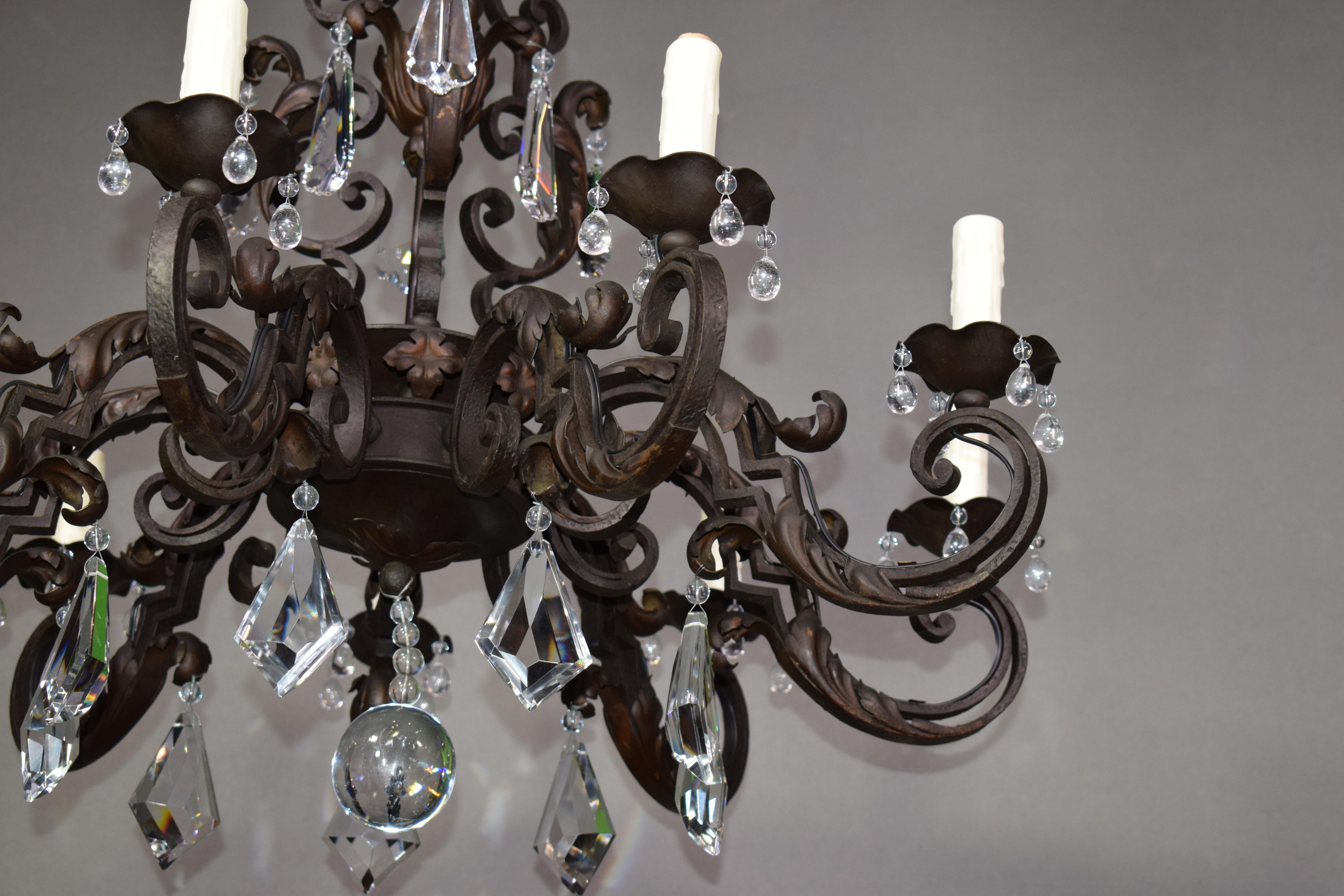 Louis XV Iron Chandelier with Crystal Pendalogues For Sale
